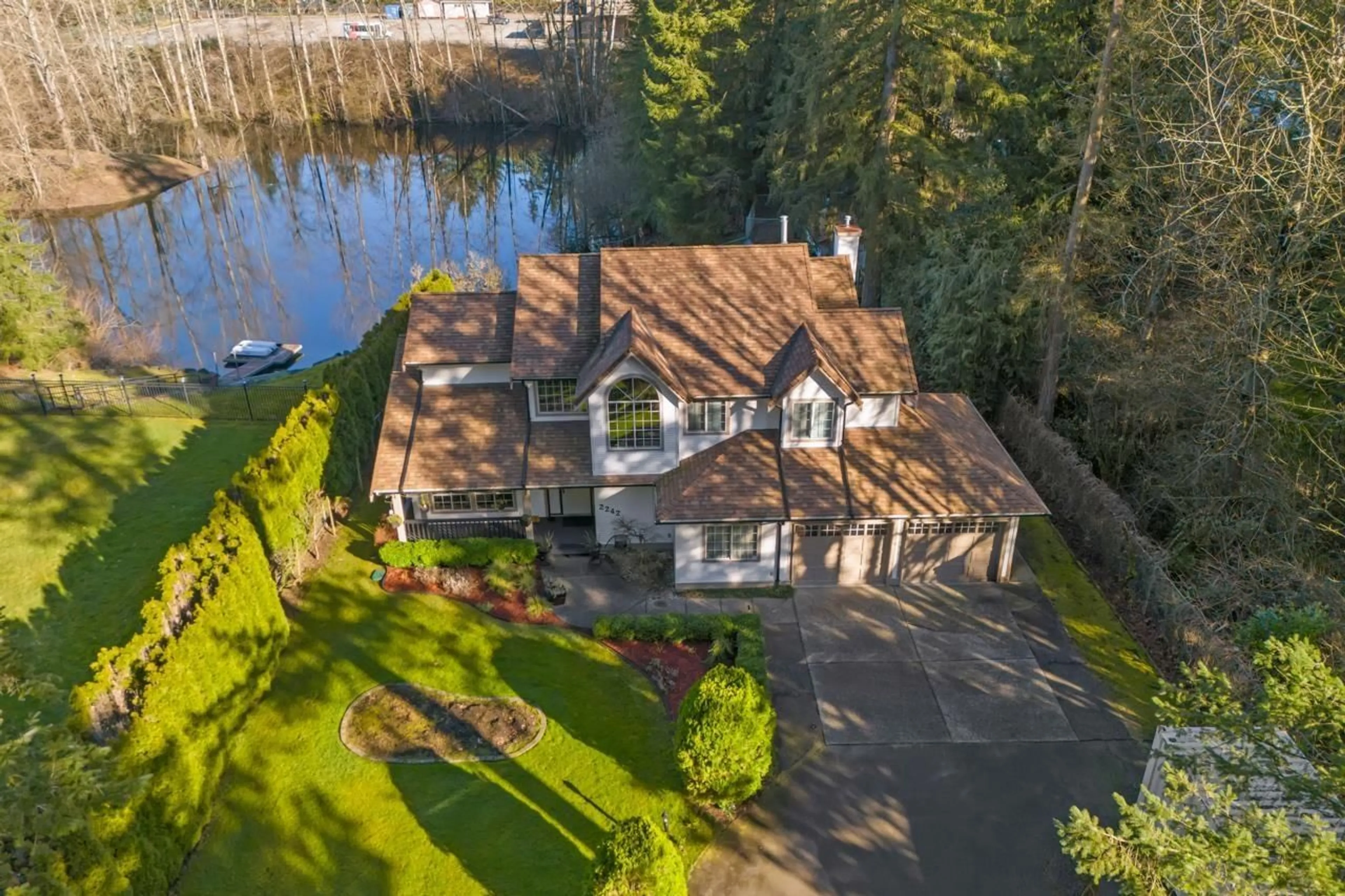 A pic from outside/outdoor area/front of a property/back of a property/a pic from drone, water/lake/river/ocean view for 2242 200 STREET, Langley British Columbia V2Z1W9
