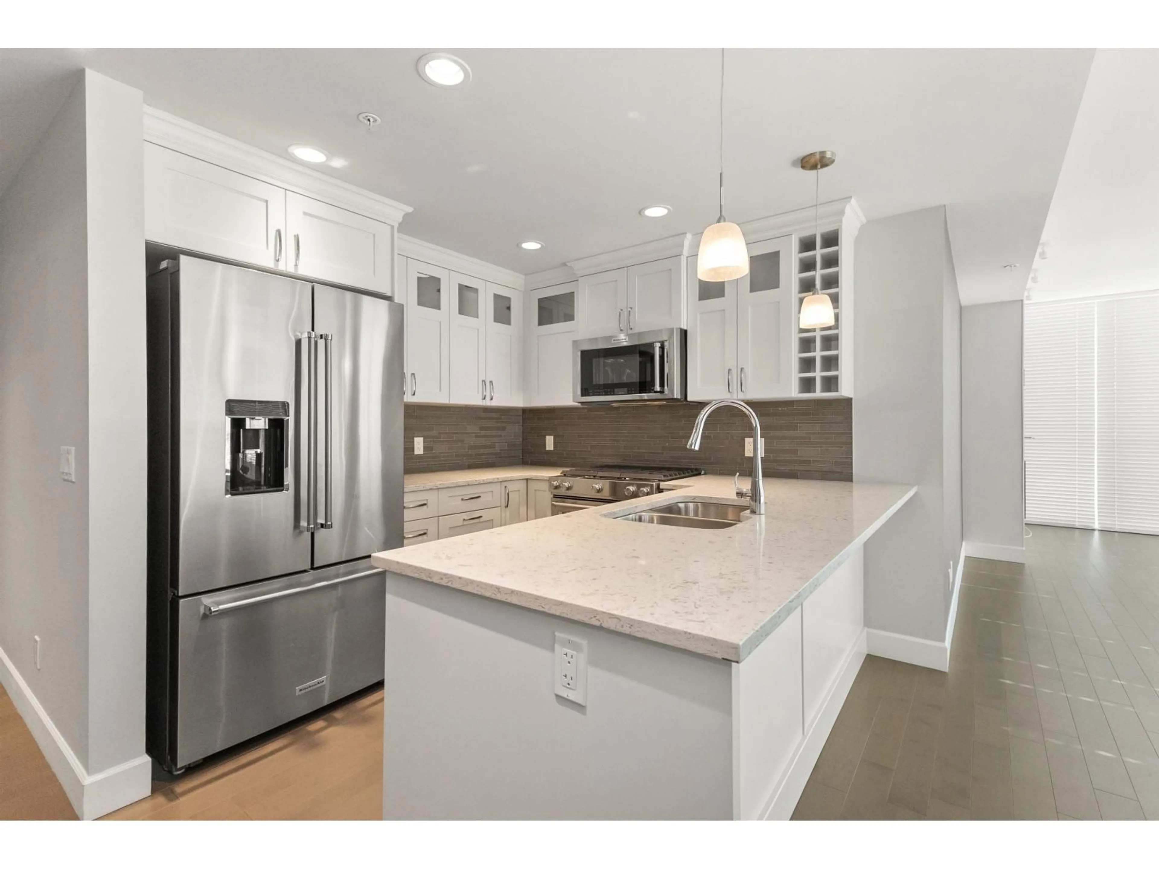 Open concept kitchen, ceramic/tile floor for 2206 - 2180 GLADWIN ROAD, Abbotsford British Columbia V2S0H4