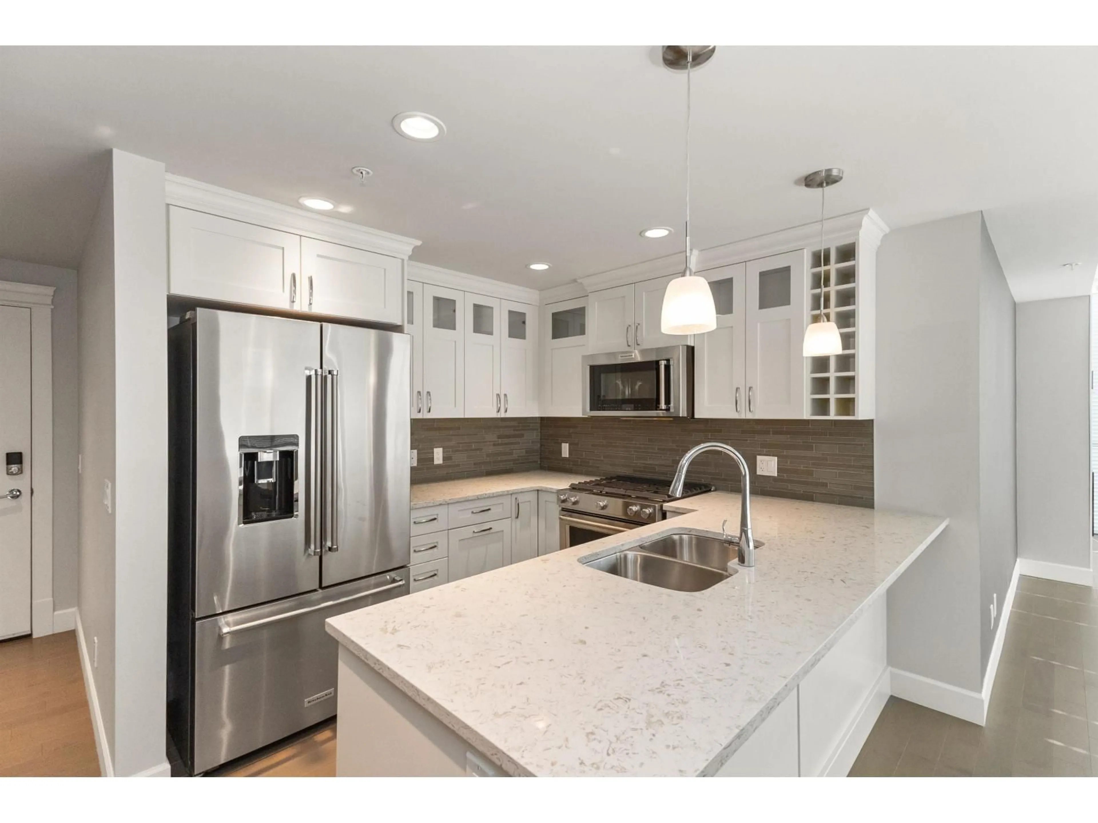 Open concept kitchen, ceramic/tile floor for 2206 - 2180 GLADWIN ROAD, Abbotsford British Columbia V2S0H4