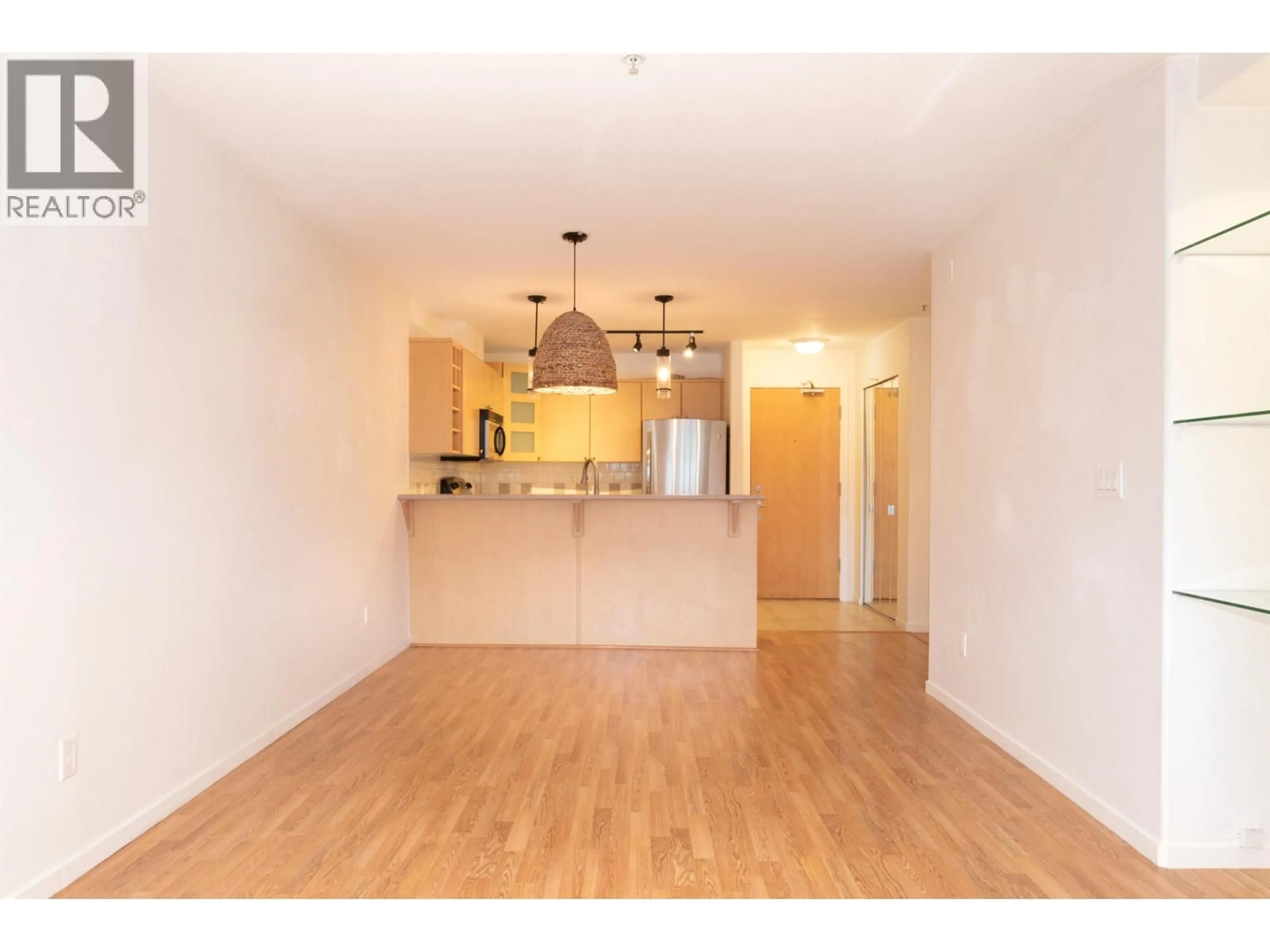 Open concept kitchen, wood/laminate floor for 105 - 3136 ST JOHNS STREET, Port Moody British Columbia V3H5E4