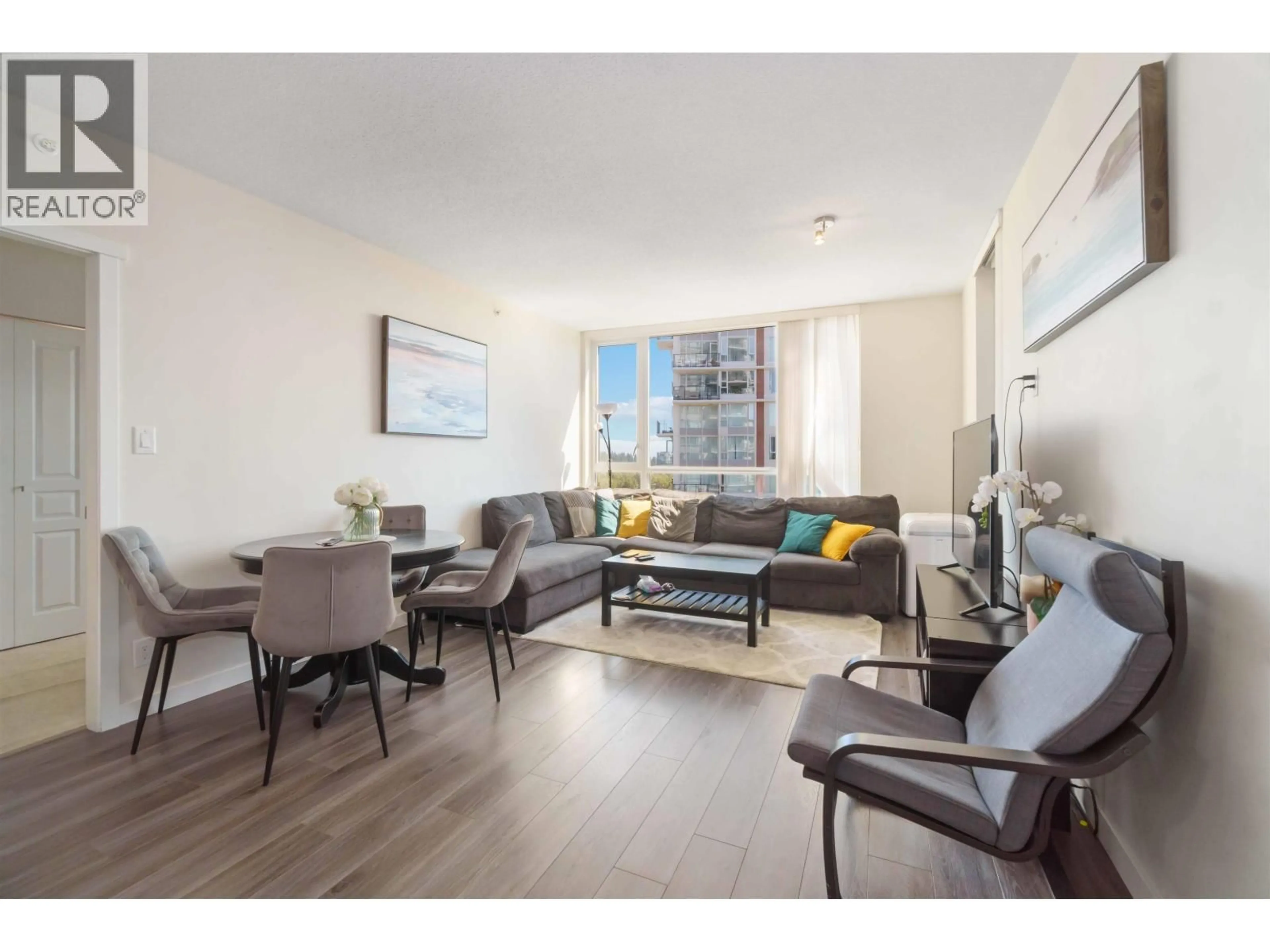 Living room with furniture, wood/laminate floor for 1502 - 3096 WINDSOR GATE, Coquitlam British Columbia V3B0P4