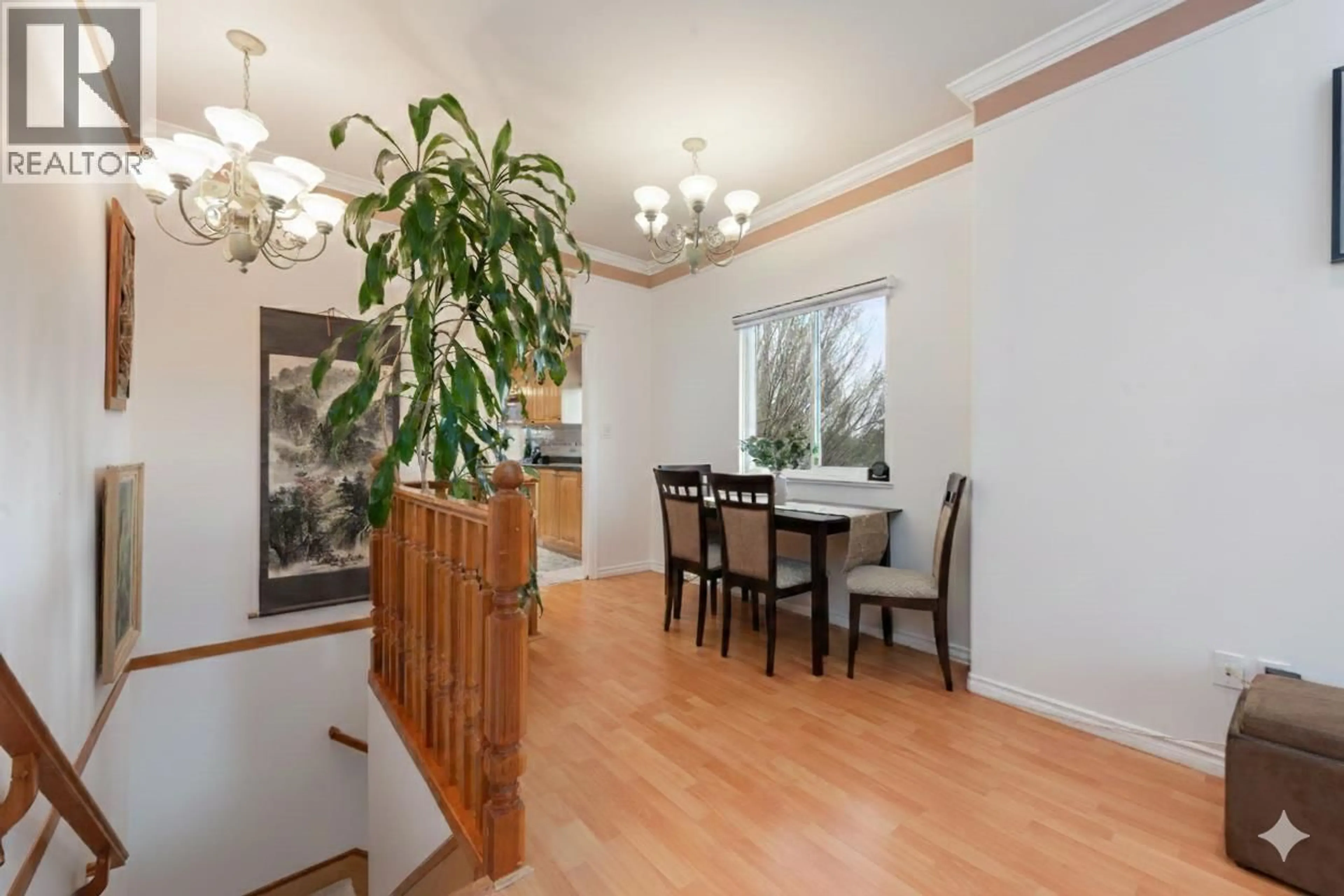 Dining room, wood/laminate floor for 2423 4TH AVENUE, Vancouver British Columbia V5M1K1