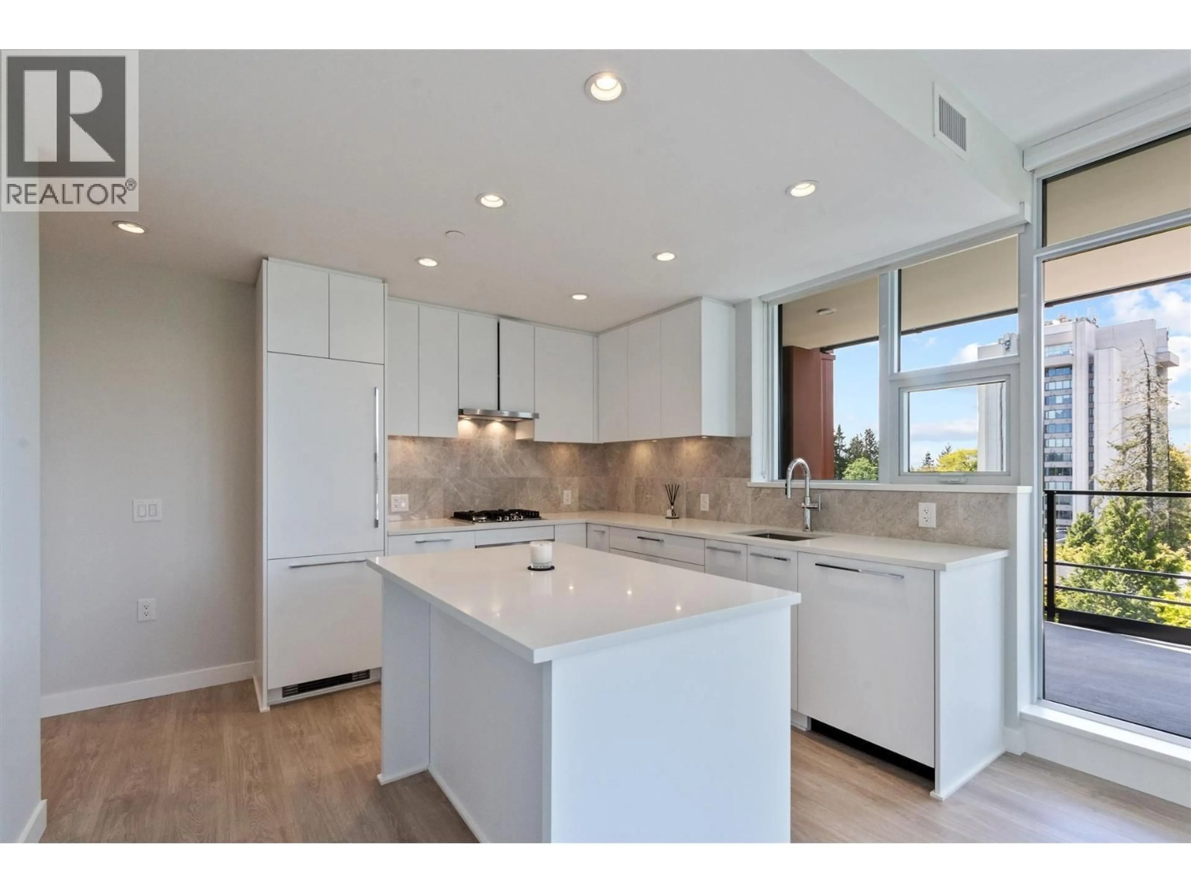 Open concept kitchen, ceramic/tile floor for 504 - 5380 CROOKED BRANCH ROAD, Vancouver British Columbia V6T0E5
