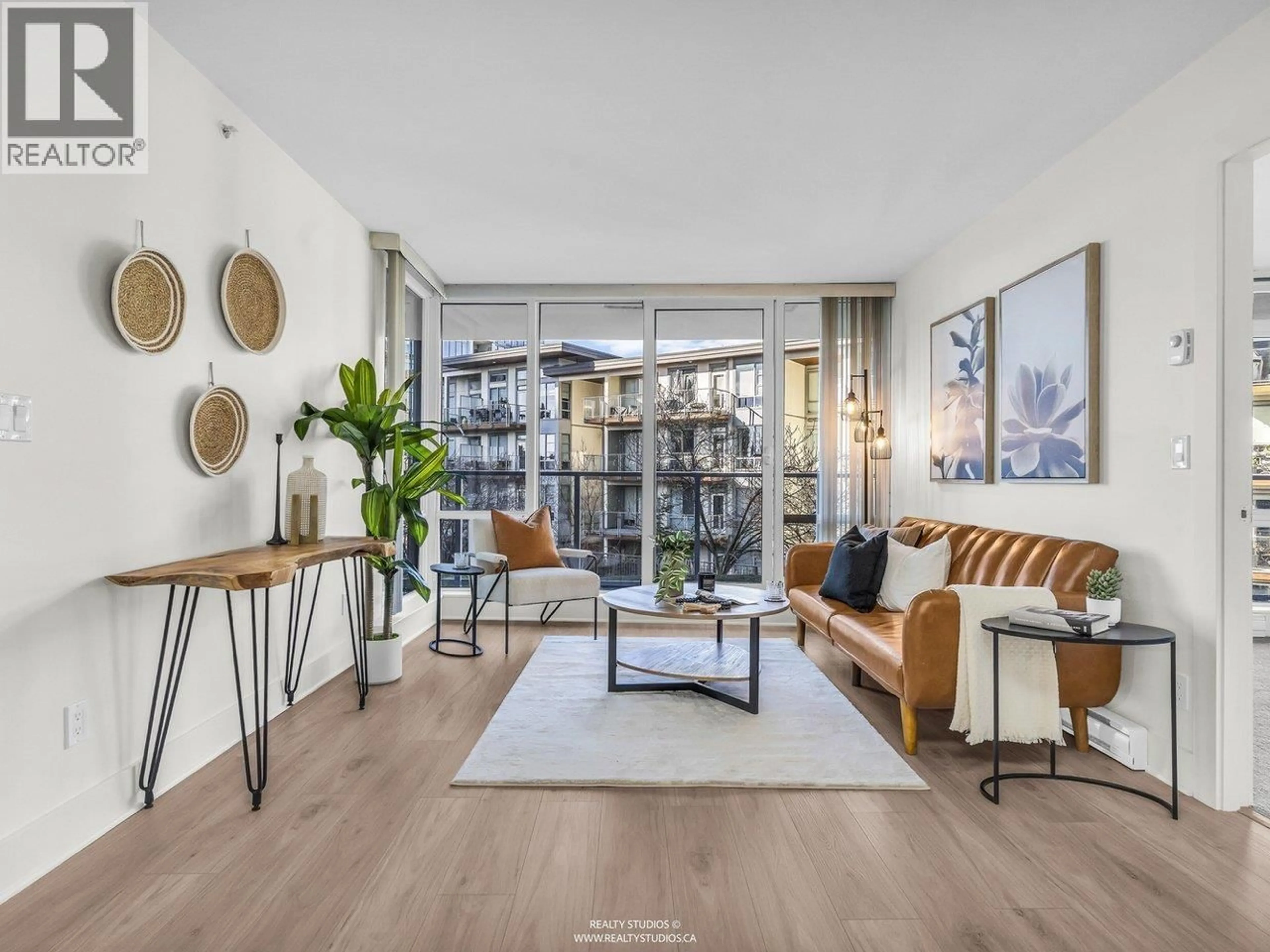 Living room with furniture, unknown for 303 - 4189 HALIFAX STREET, Burnaby British Columbia V5C0H9