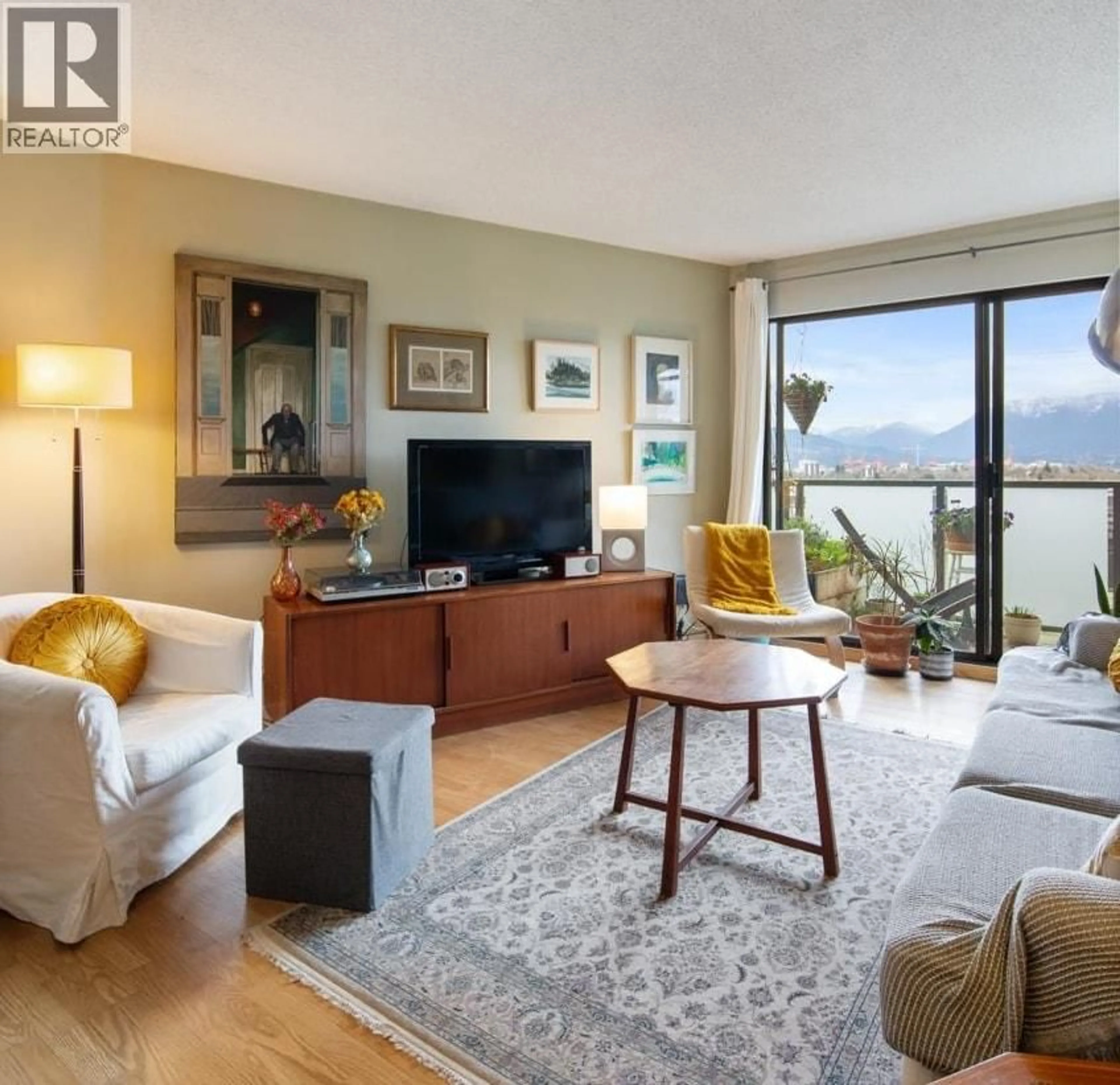 Living room with furniture, wood/laminate floor for 314 - 665 6TH AVENUE, Vancouver British Columbia V5T4J3