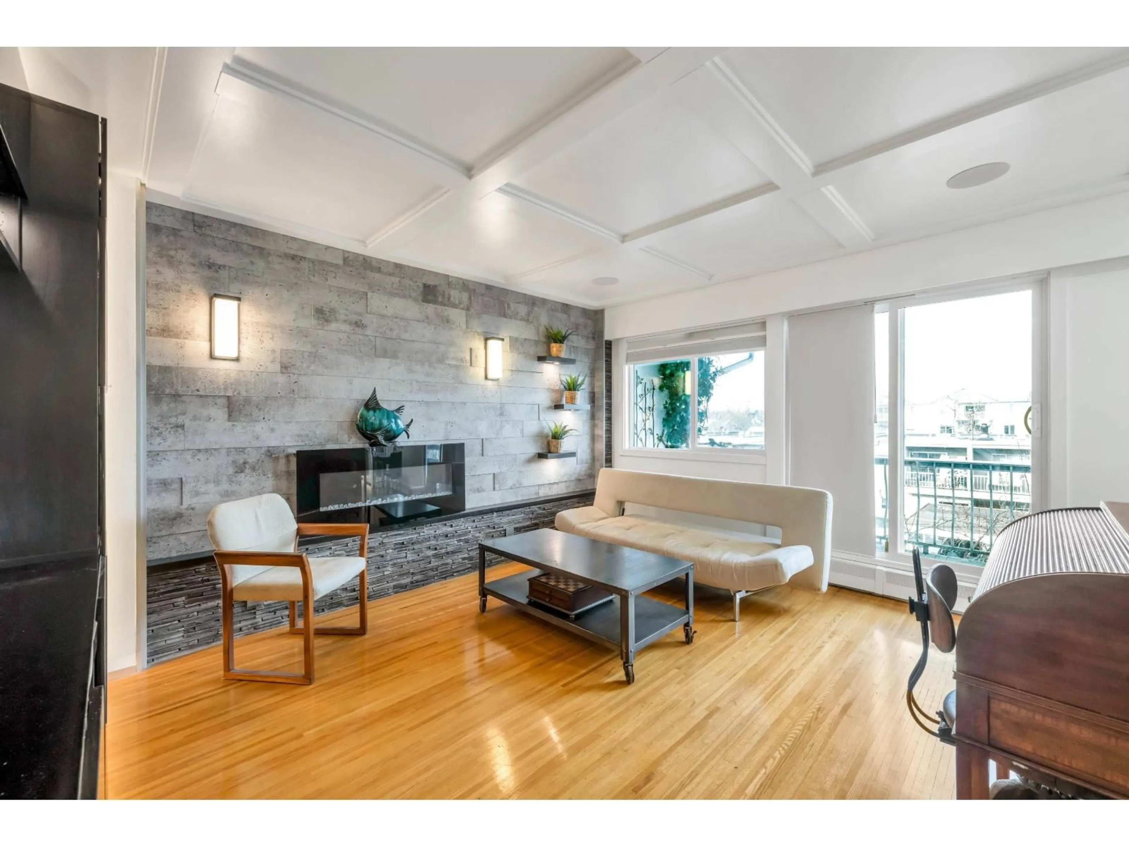 Living room with furniture, wood/laminate floor for 325 - 17707 57A AVENUE, Surrey British Columbia V3S1J2