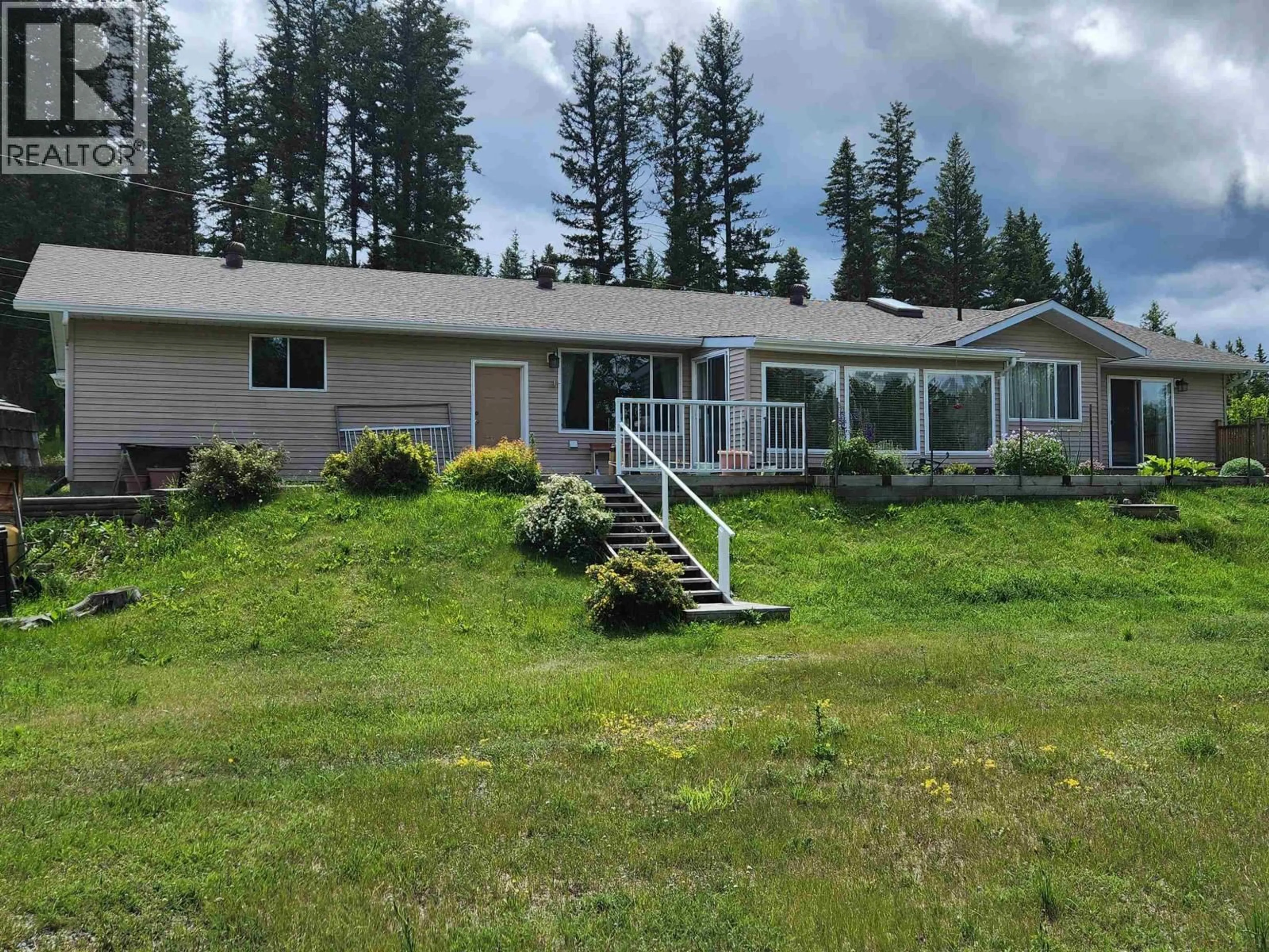 A pic from outside/outdoor area/front of a property/back of a property/a pic from drone, mountain view for 5207 KALLUM DRIVE, 108 Mile Ranch British Columbia V0K2Z0