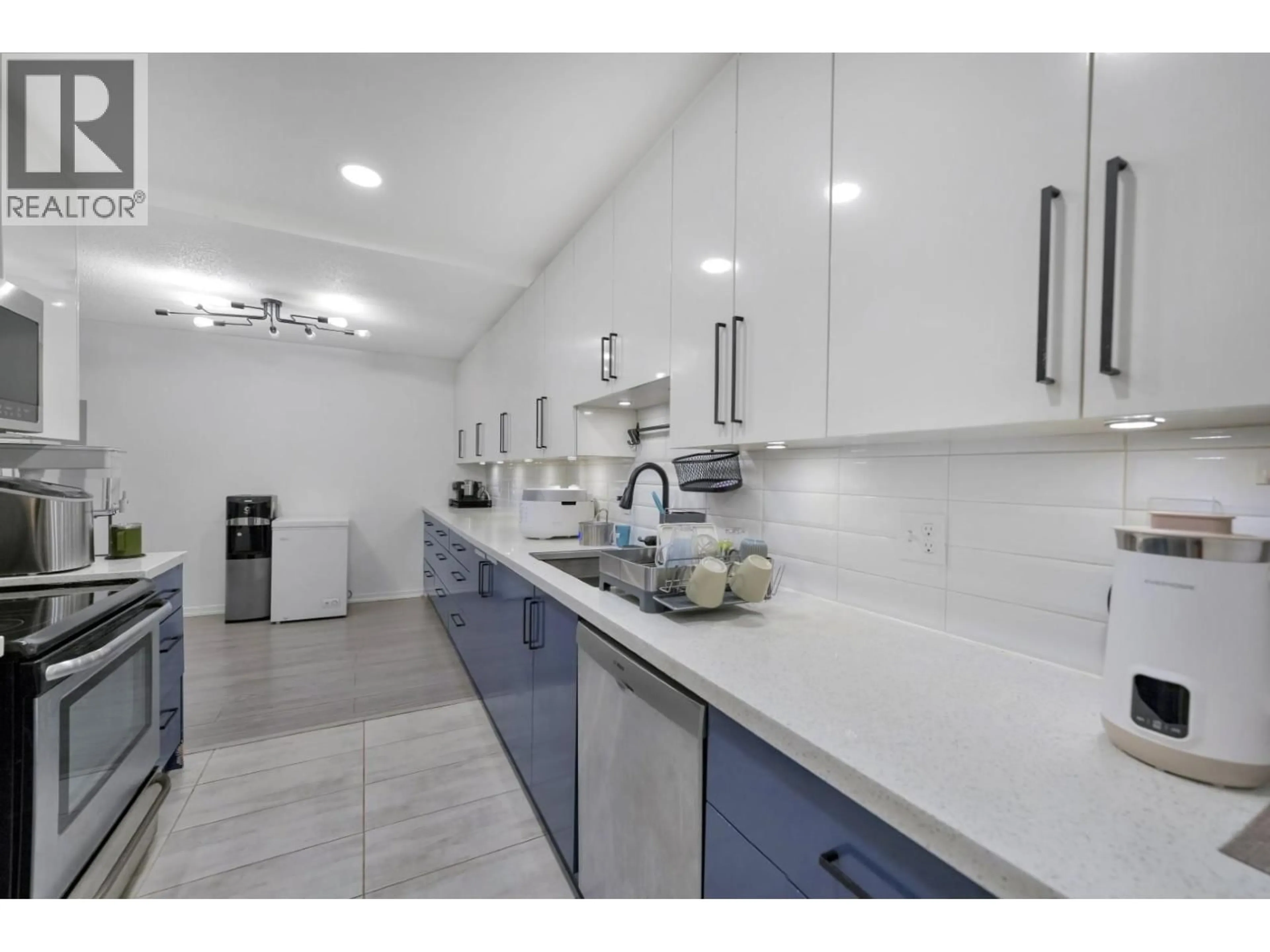 Open concept kitchen, ceramic/tile floor for 106 - 8720 NO. 1 ROAD, Richmond British Columbia V7C4L5