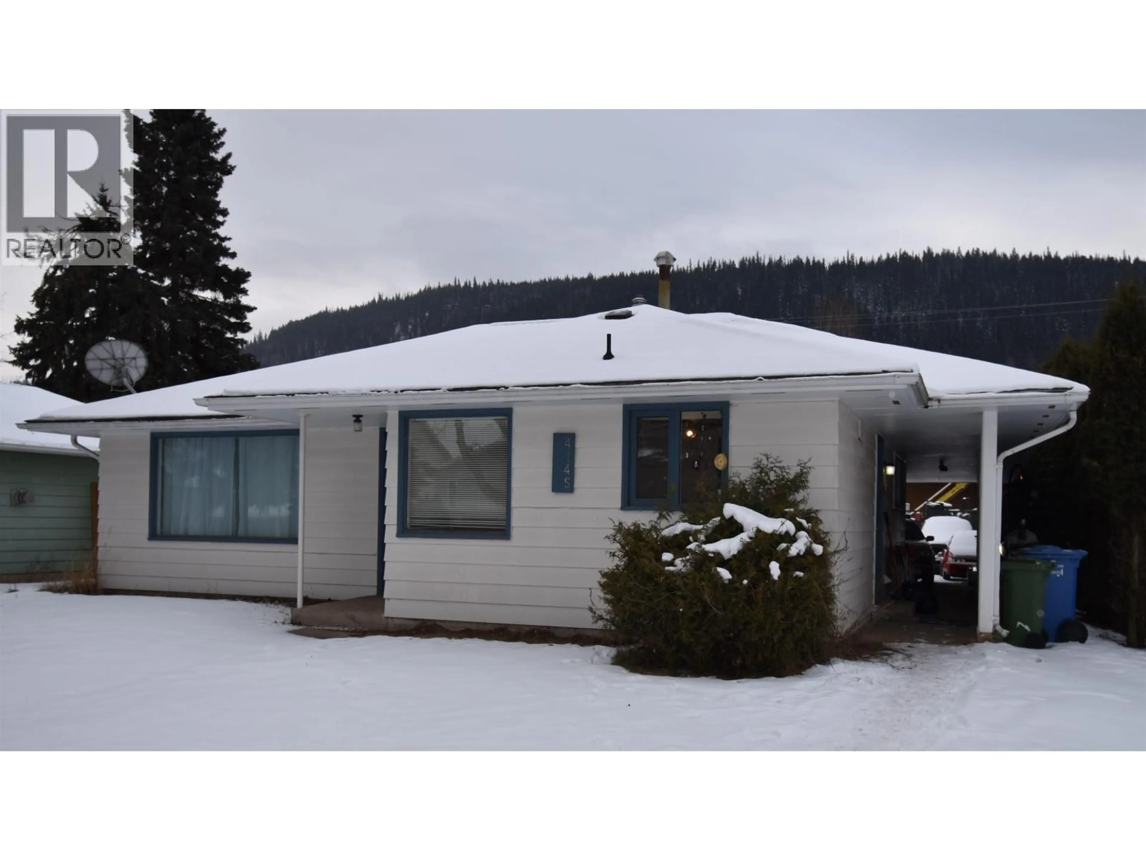 Home with vinyl exterior material, mountain view for 4145 ALFRED AVENUE, Smithers British Columbia V0J2N0