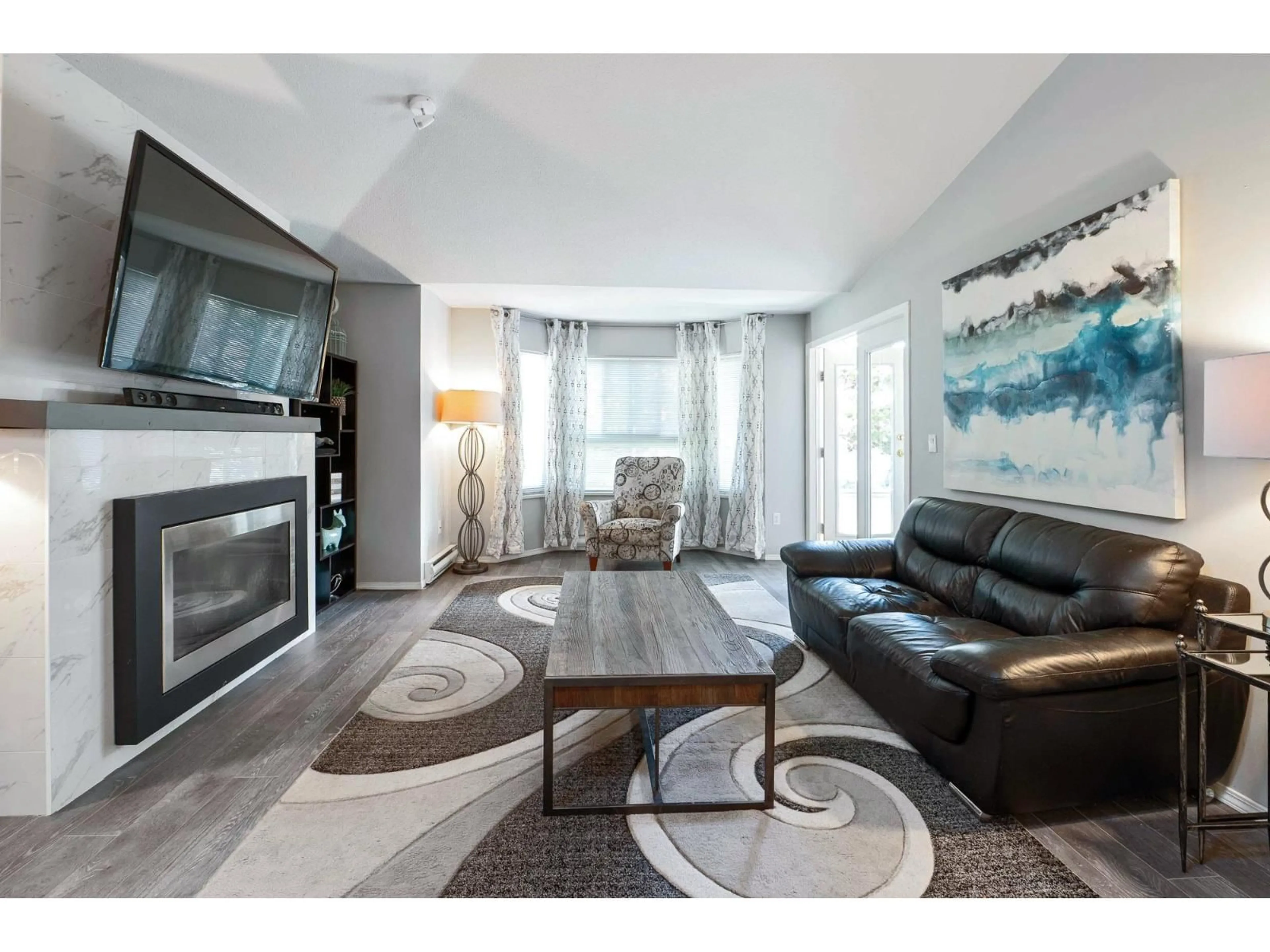 Living room with furniture, unknown for 305 - 19721 64 AVENUE, Langley British Columbia V2Y1L1