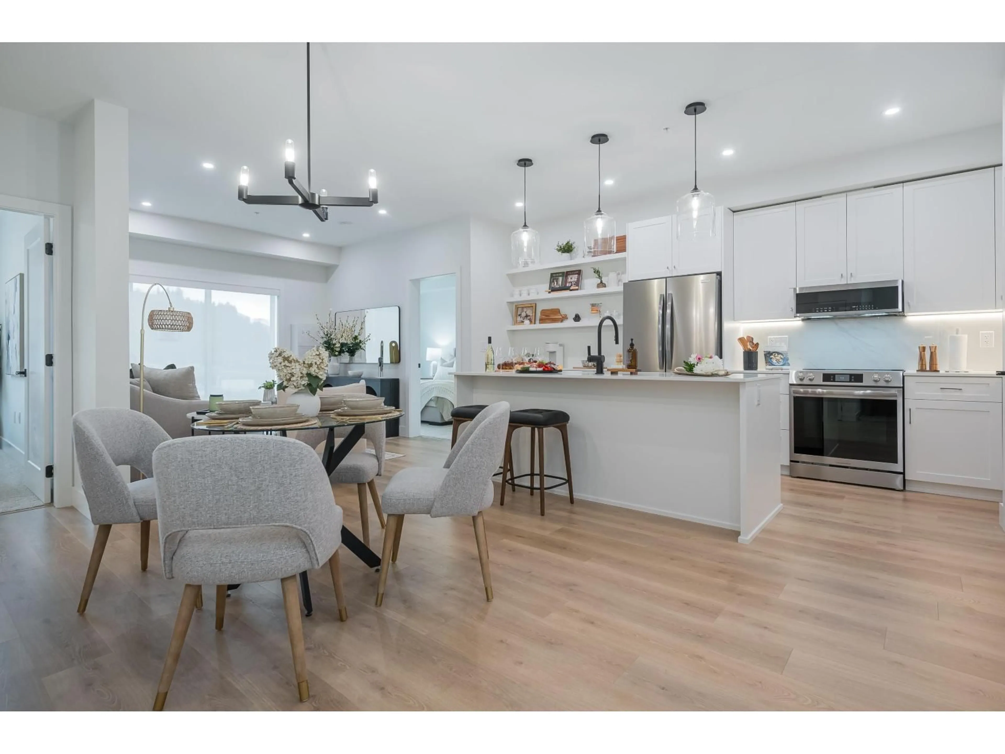 Open concept kitchen, wood/laminate floor for 201 - 46185 THOMAS ROAD, Chilliwack British Columbia V2R6H3