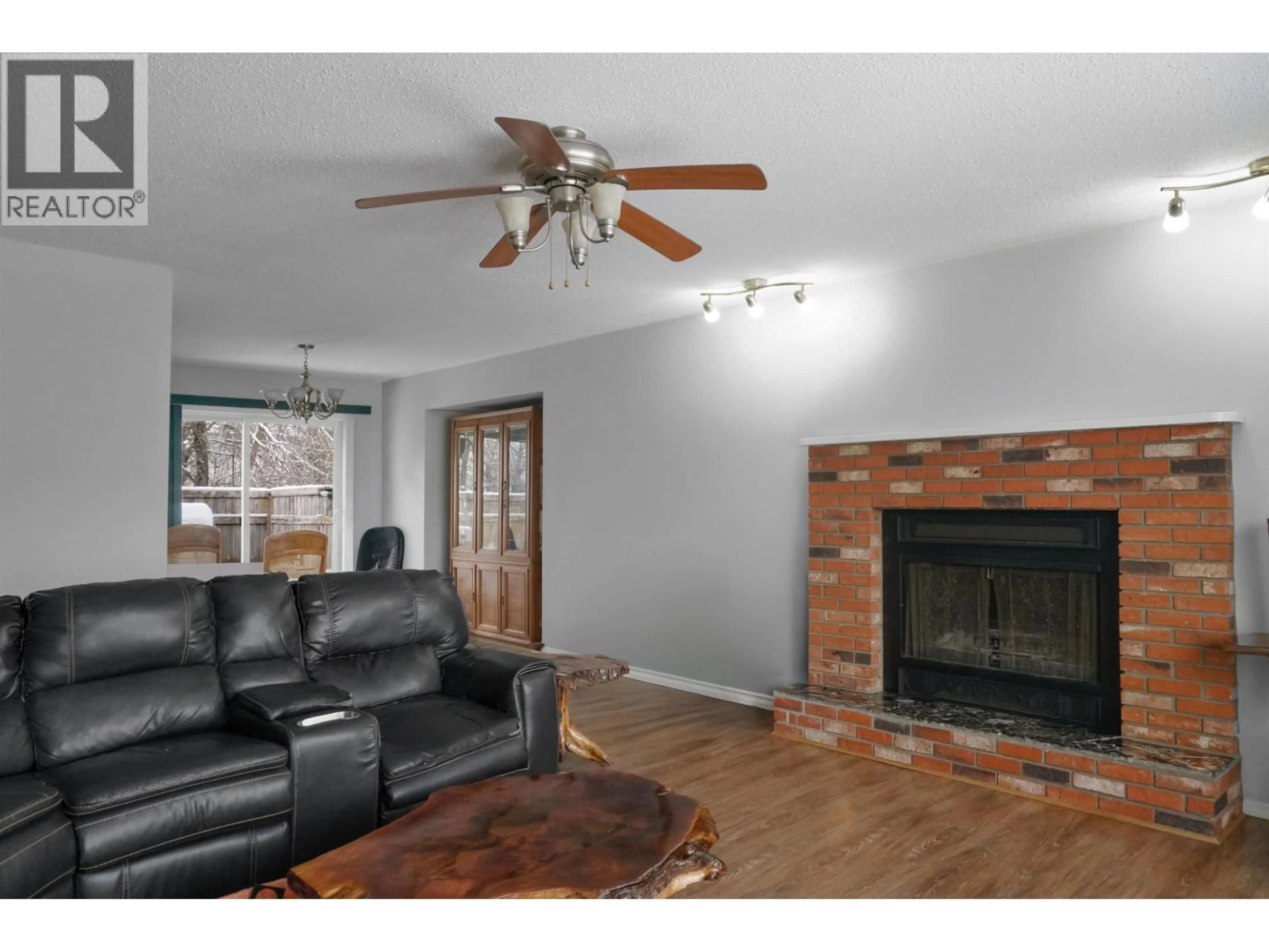 Living room with furniture, wood/laminate floor for 32 SMITH STREET, Kitimat British Columbia V8C2L6