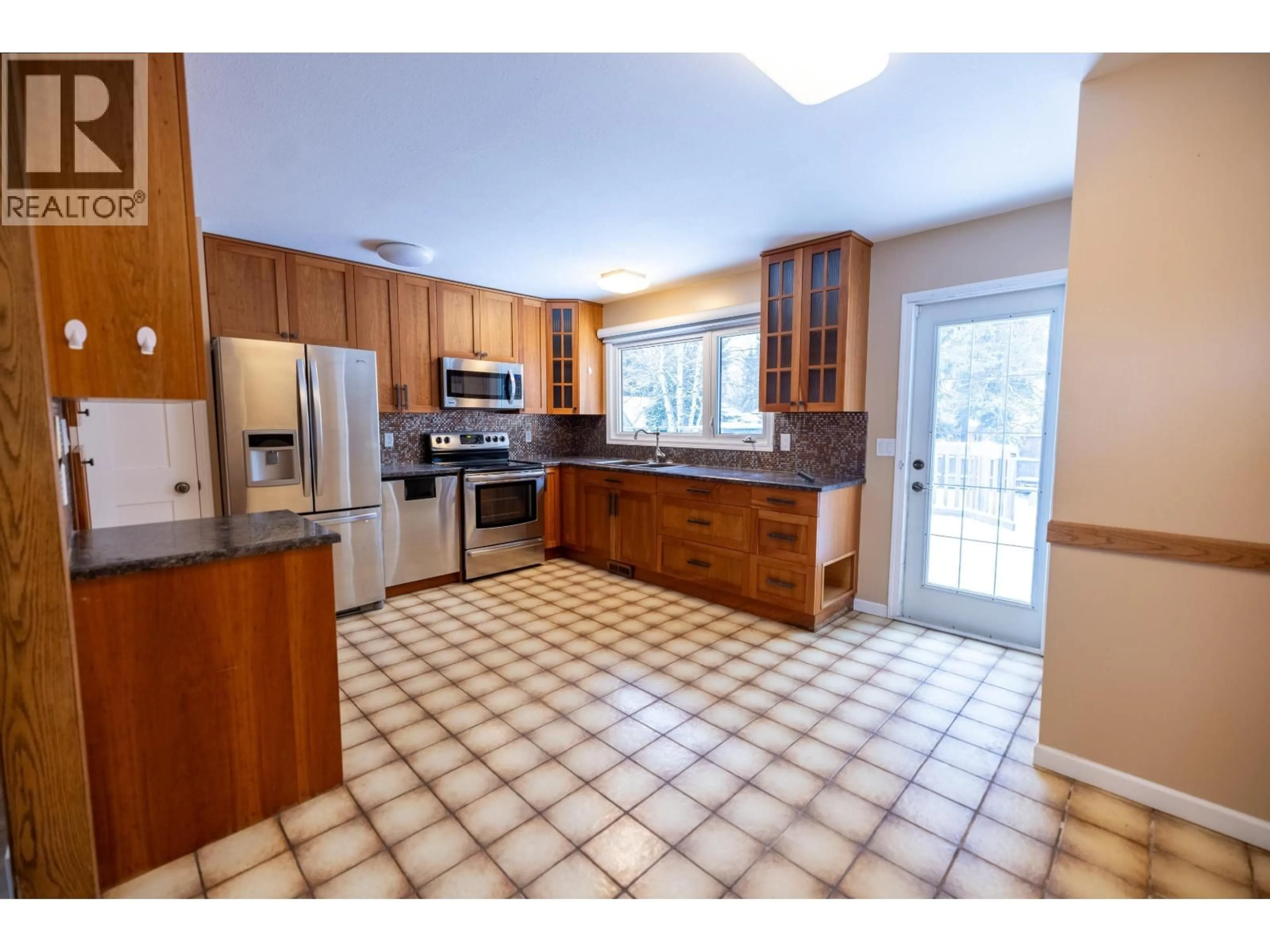 Open concept kitchen, ceramic/tile floor for 7996 NEWCASTLE CRESCENT, Prince George British Columbia V2N3X5