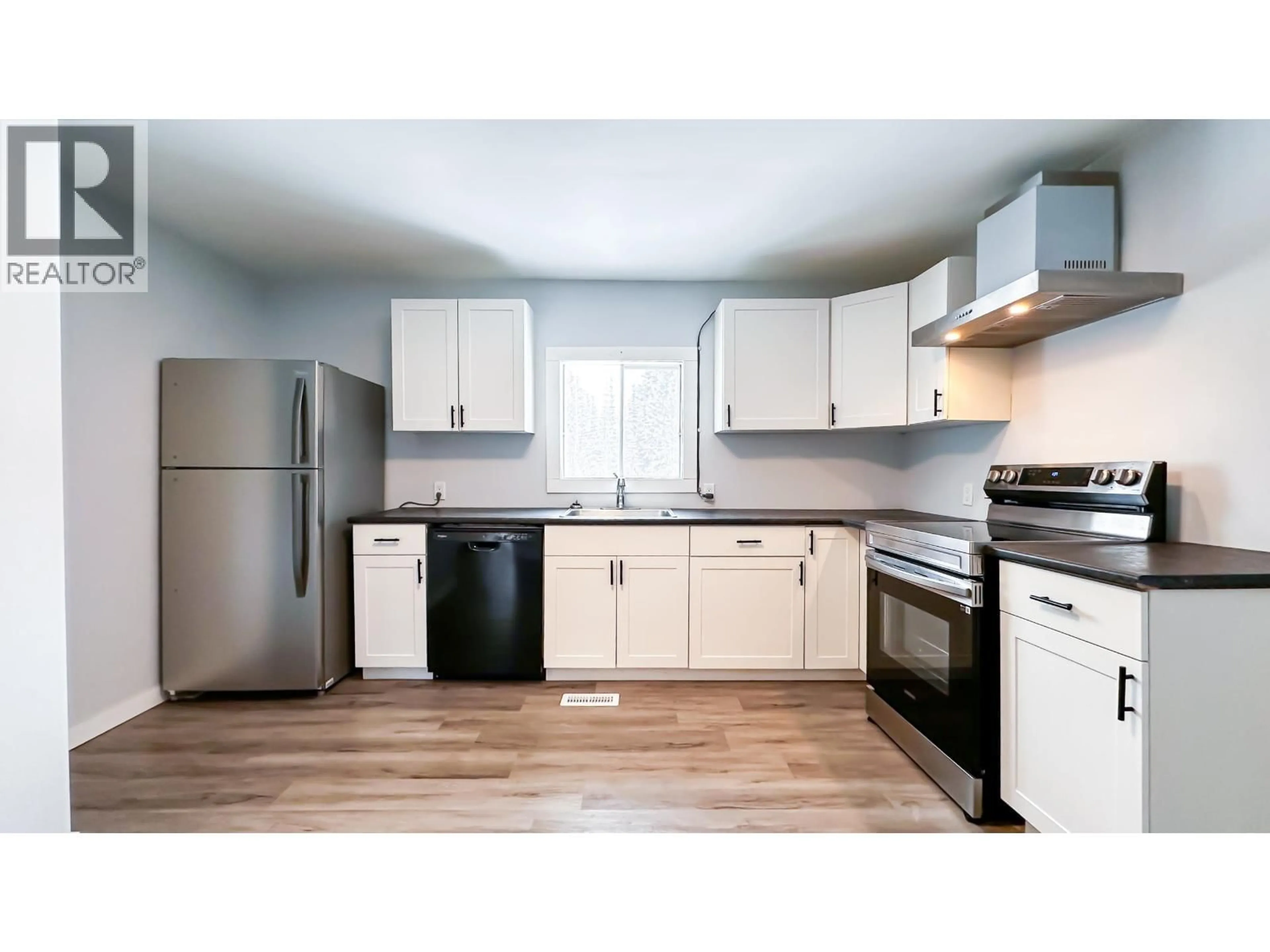 Standard kitchen, wood/laminate floor for 5565 BENDIXON ROAD, Prince George British Columbia V2N5V3