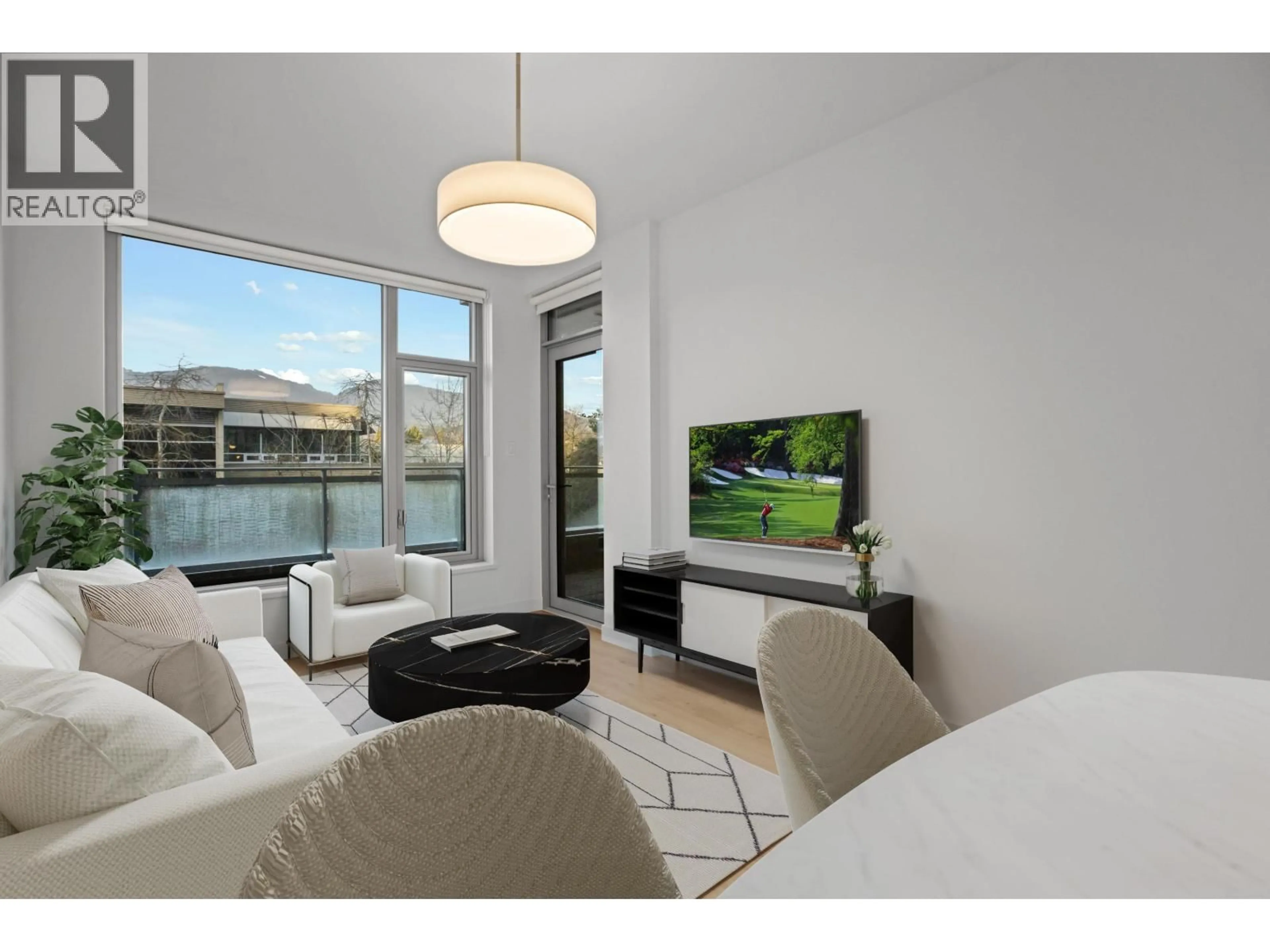 Living room with furniture, unknown for 310 - 755 HARBOURSIDE DRIVE, North Vancouver British Columbia V7P0G1