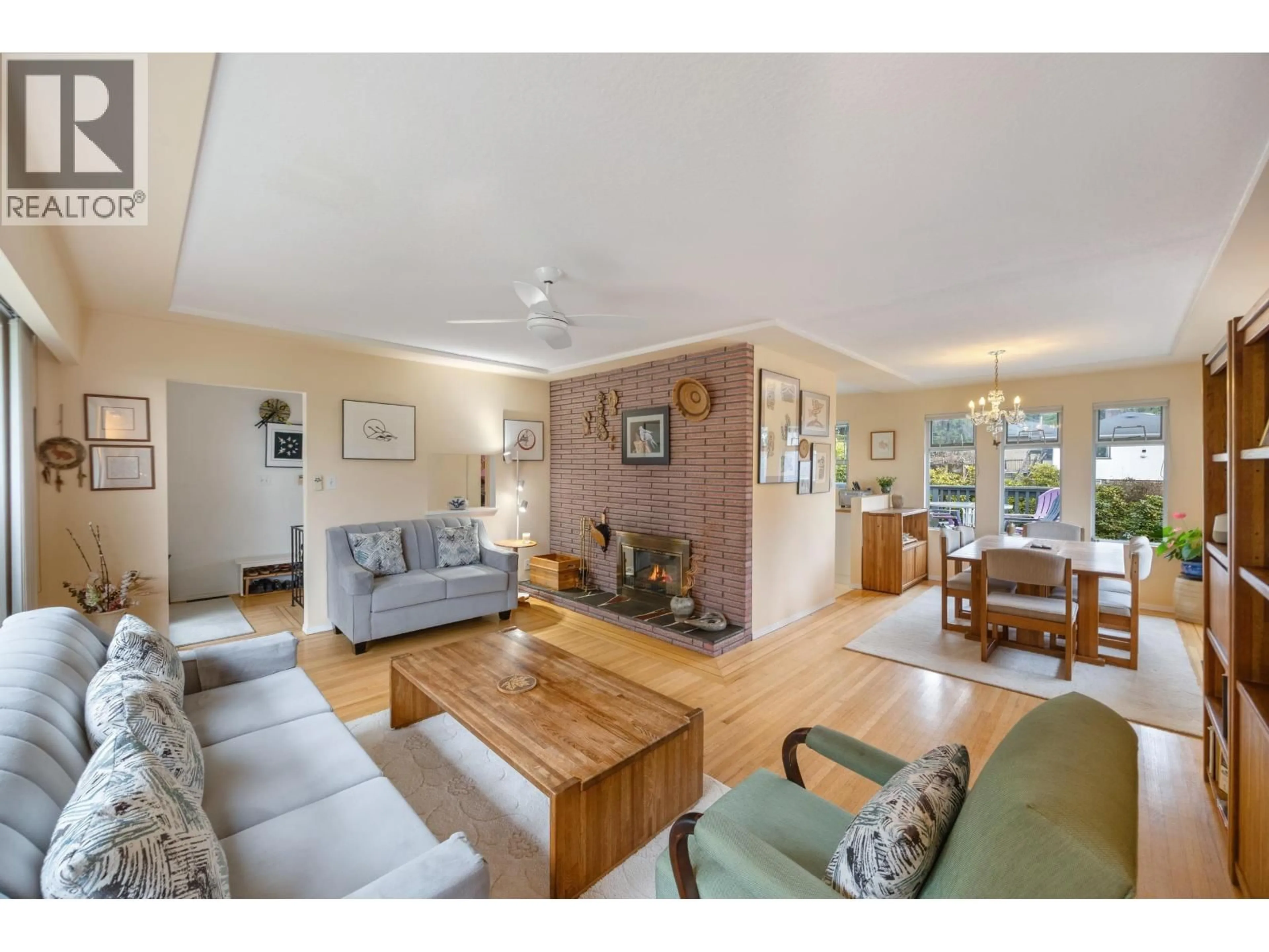 Living room with furniture, wood/laminate floor for 8608 BULLER AVENUE, Burnaby British Columbia V5J4V3