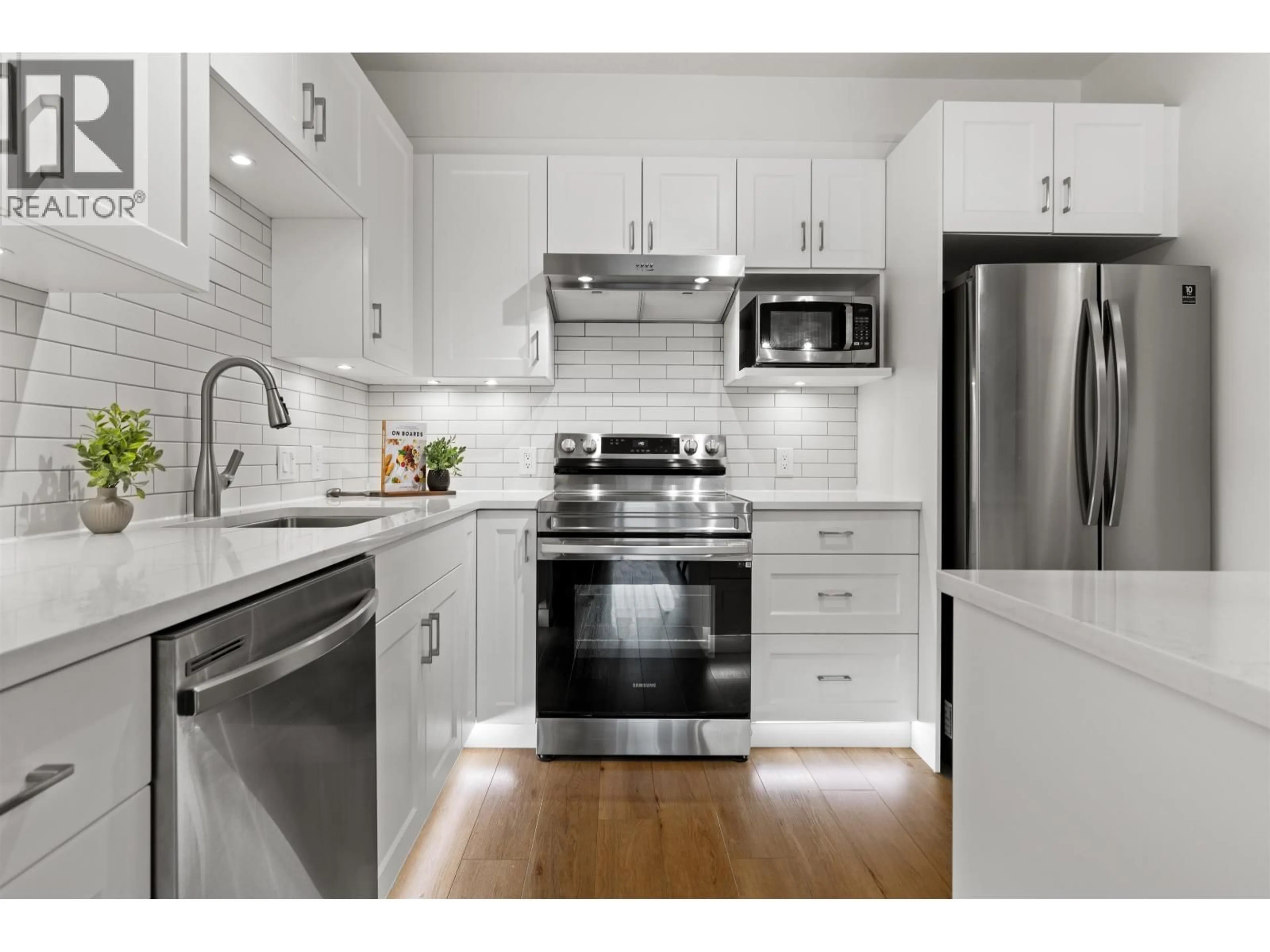 Open concept kitchen, wood/laminate floor for 212 - 19091 MCMYN ROAD, Pitt Meadows British Columbia V3Y2S8