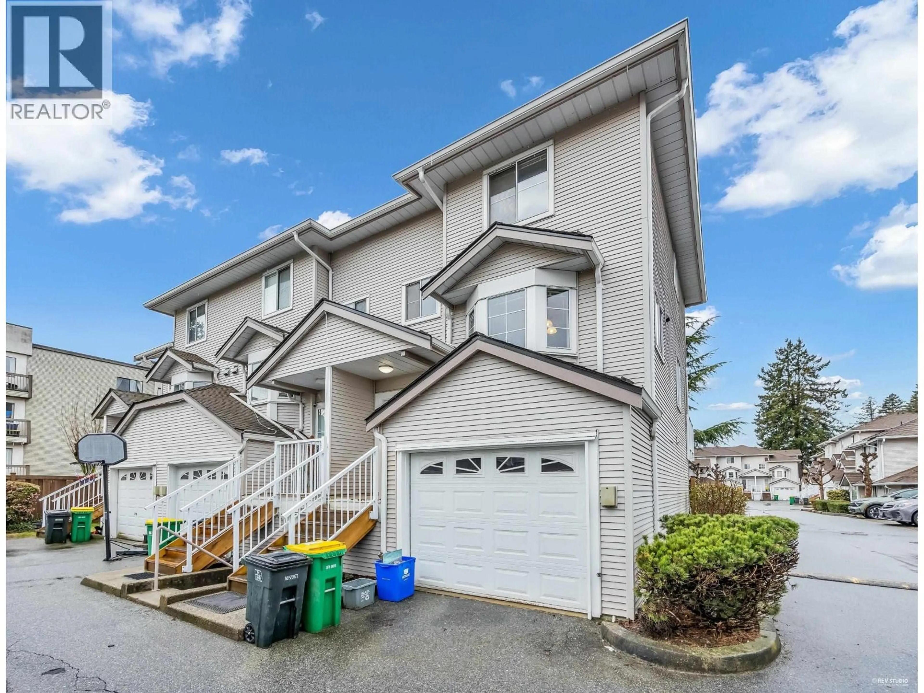 A pic from outside/outdoor area/front of a property/back of a property/a pic from drone, street for 20 - 12188 HARRIS ROAD, Pitt Meadows British Columbia V3Y2N3