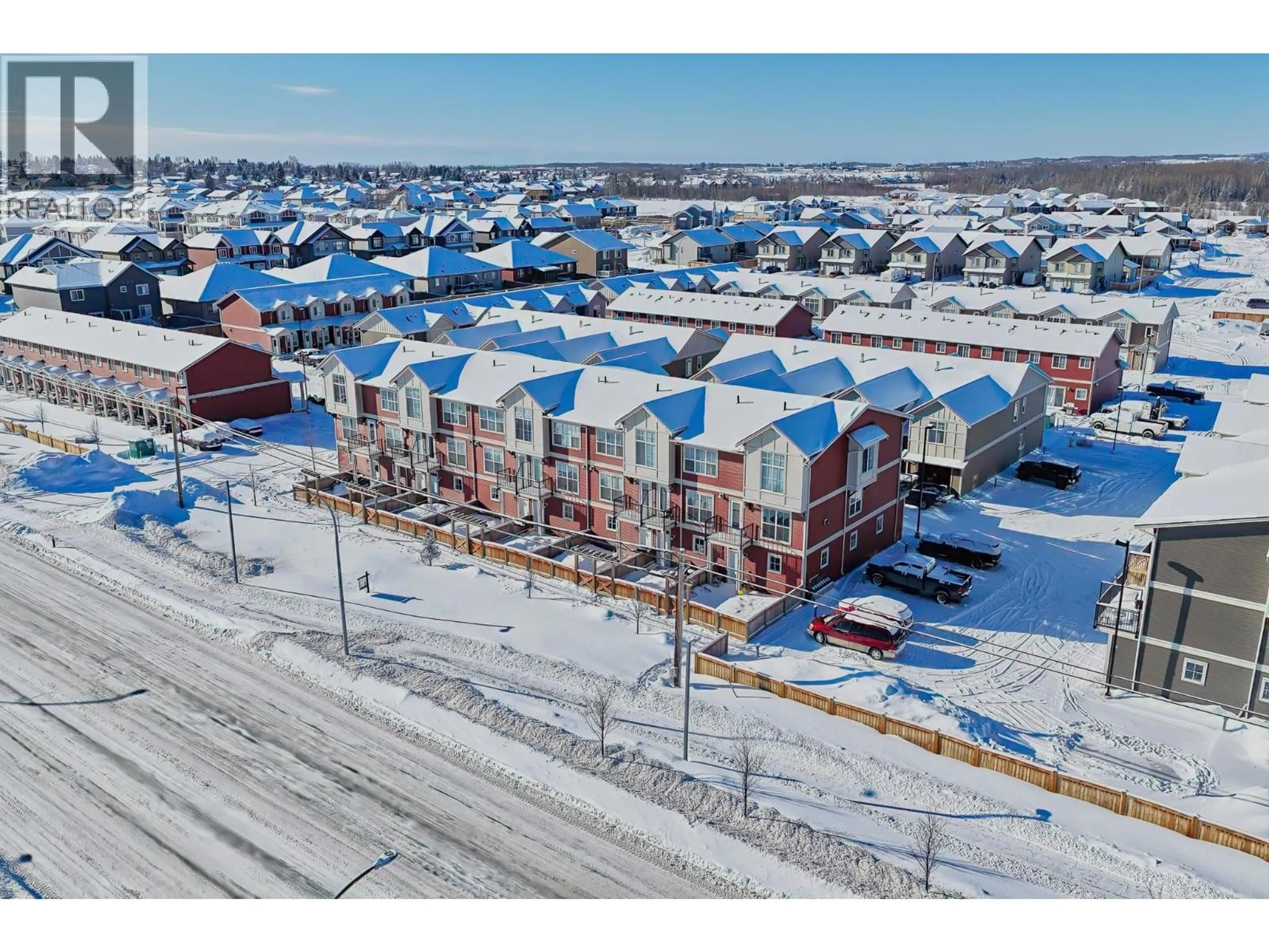 A pic from outside/outdoor area/front of a property/back of a property/a pic from drone, street for 204 - 11703 102 STREET, Fort St. John British Columbia V1J0R7