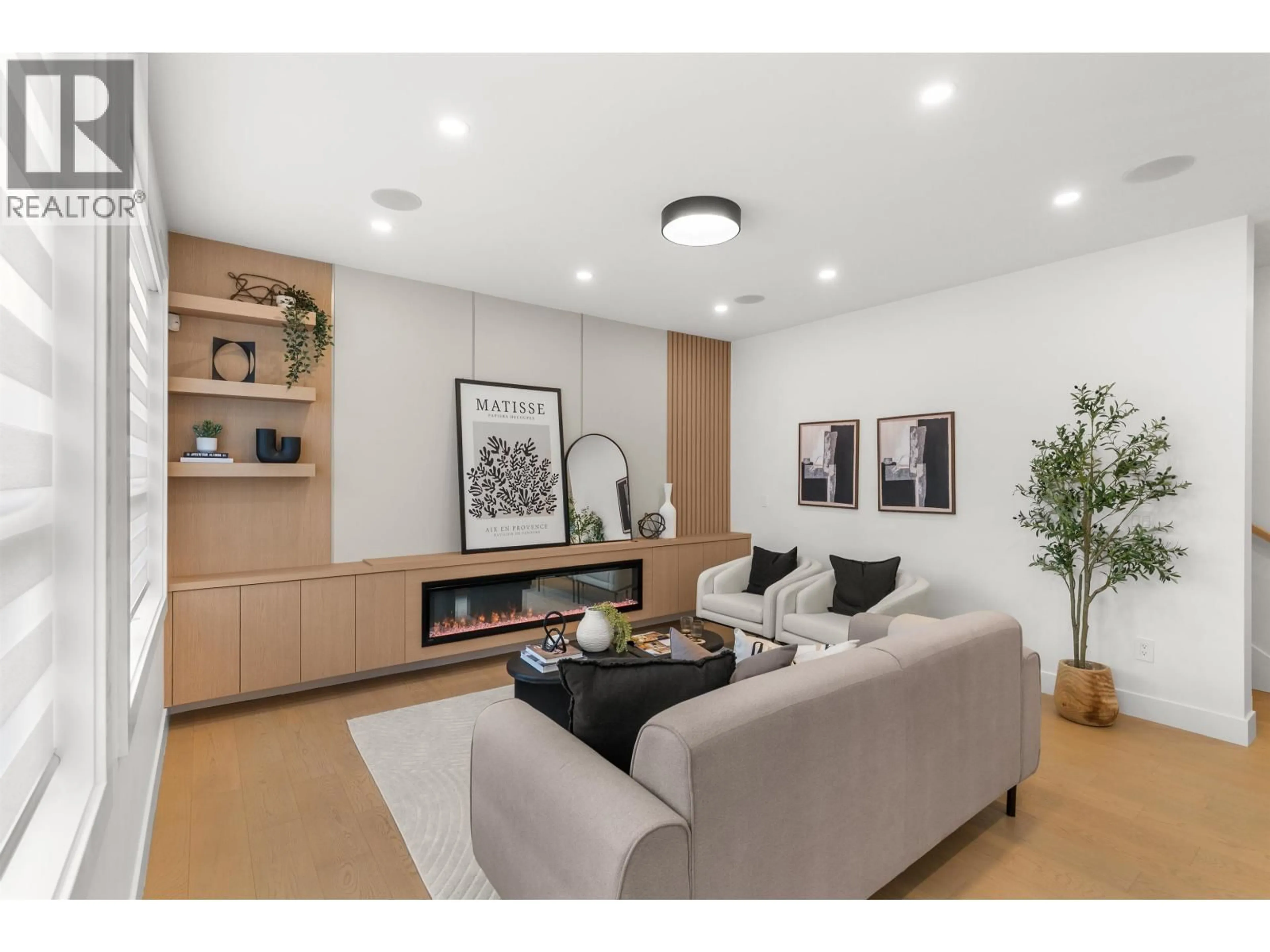 Living room with furniture, wood/laminate floor for 4816 42A AVENUE, Ladner British Columbia V4K1A1