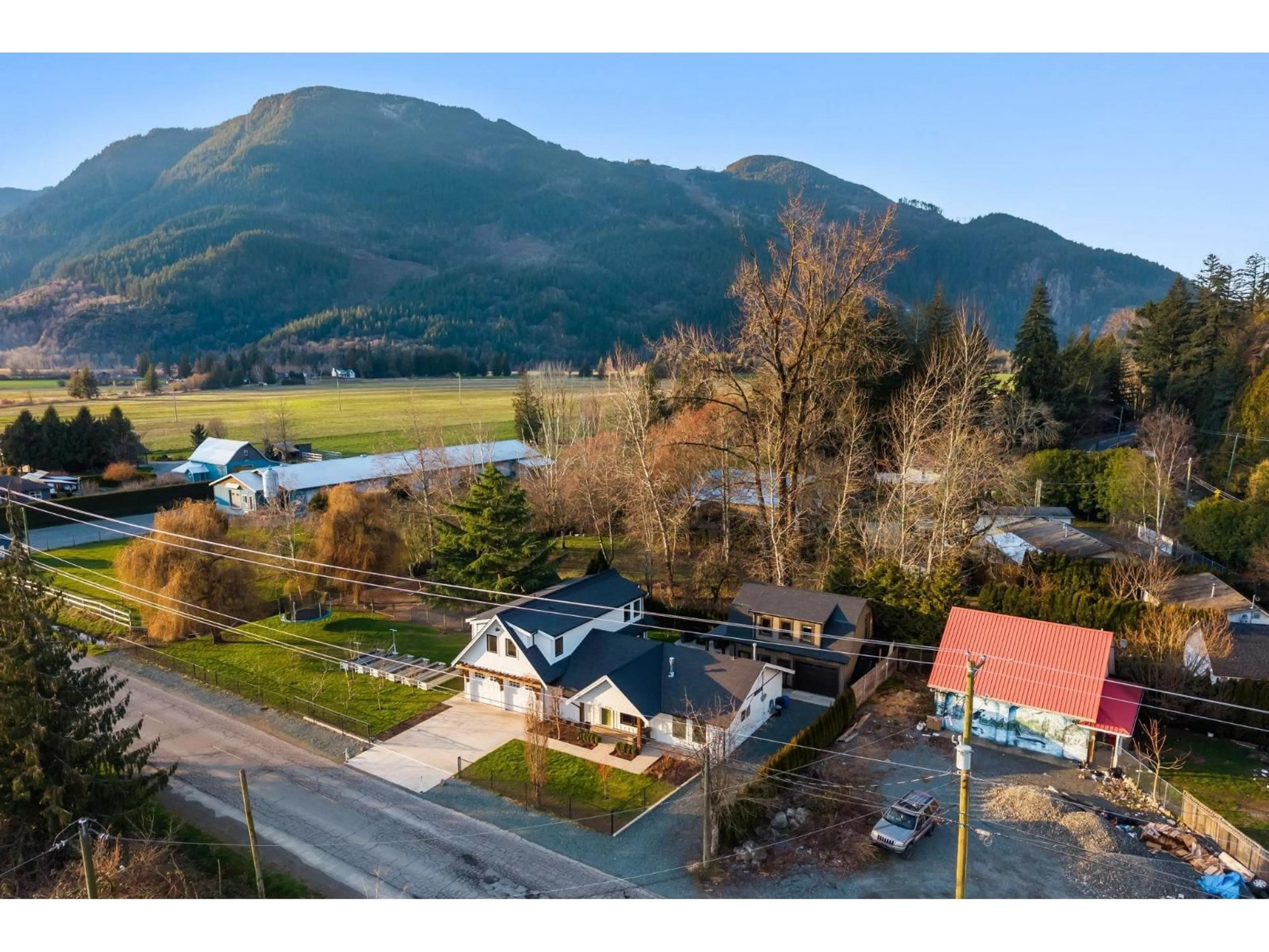 A pic from outside/outdoor area/front of a property/back of a property/a pic from drone, mountain view for 6341 MCCALLUM ROAD, Agassiz British Columbia V0M1A3
