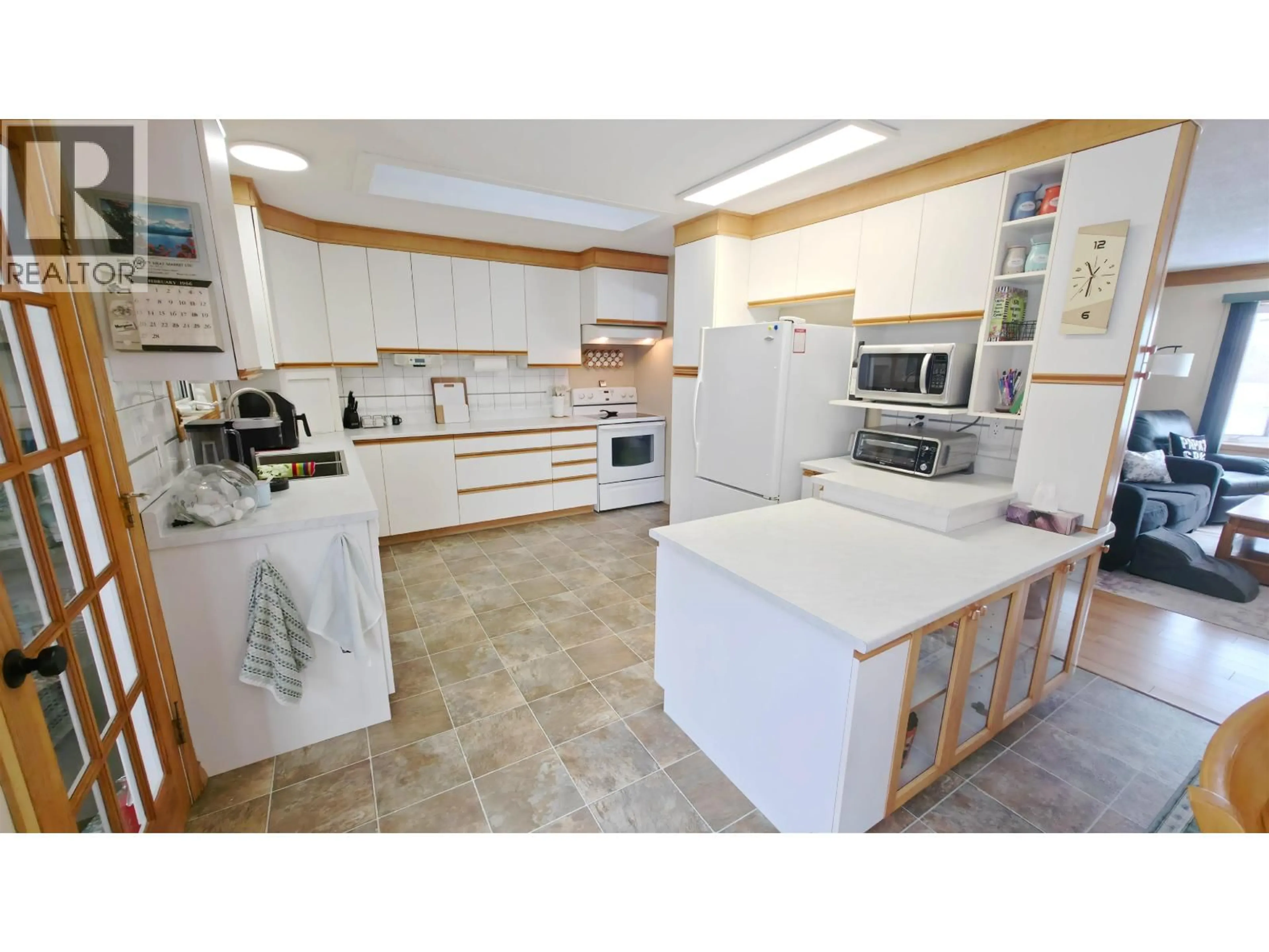 Open concept kitchen, ceramic/tile floor for 32 MORRISON STREET, Granisle British Columbia V0J1W0