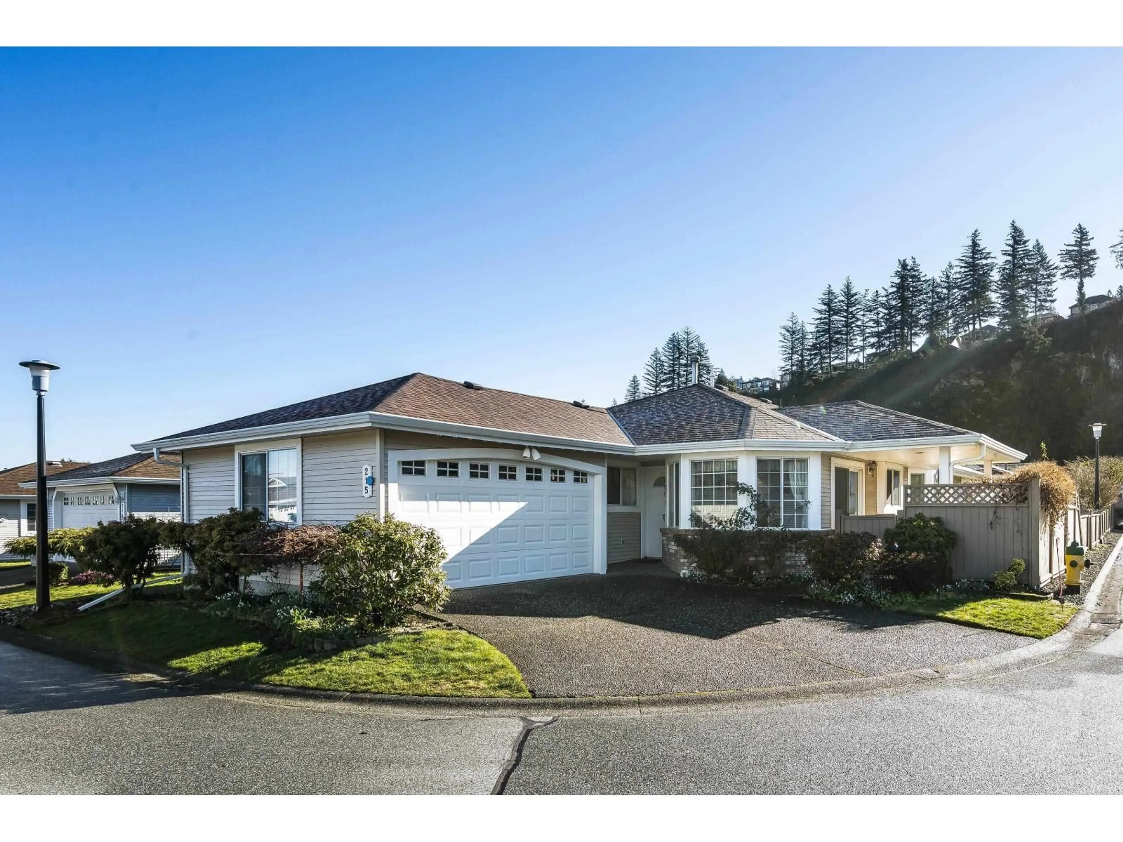 Home with vinyl exterior material, street for 215 - 6001 PROMONTORY ROAD, Chilliwack British Columbia V2R3E3