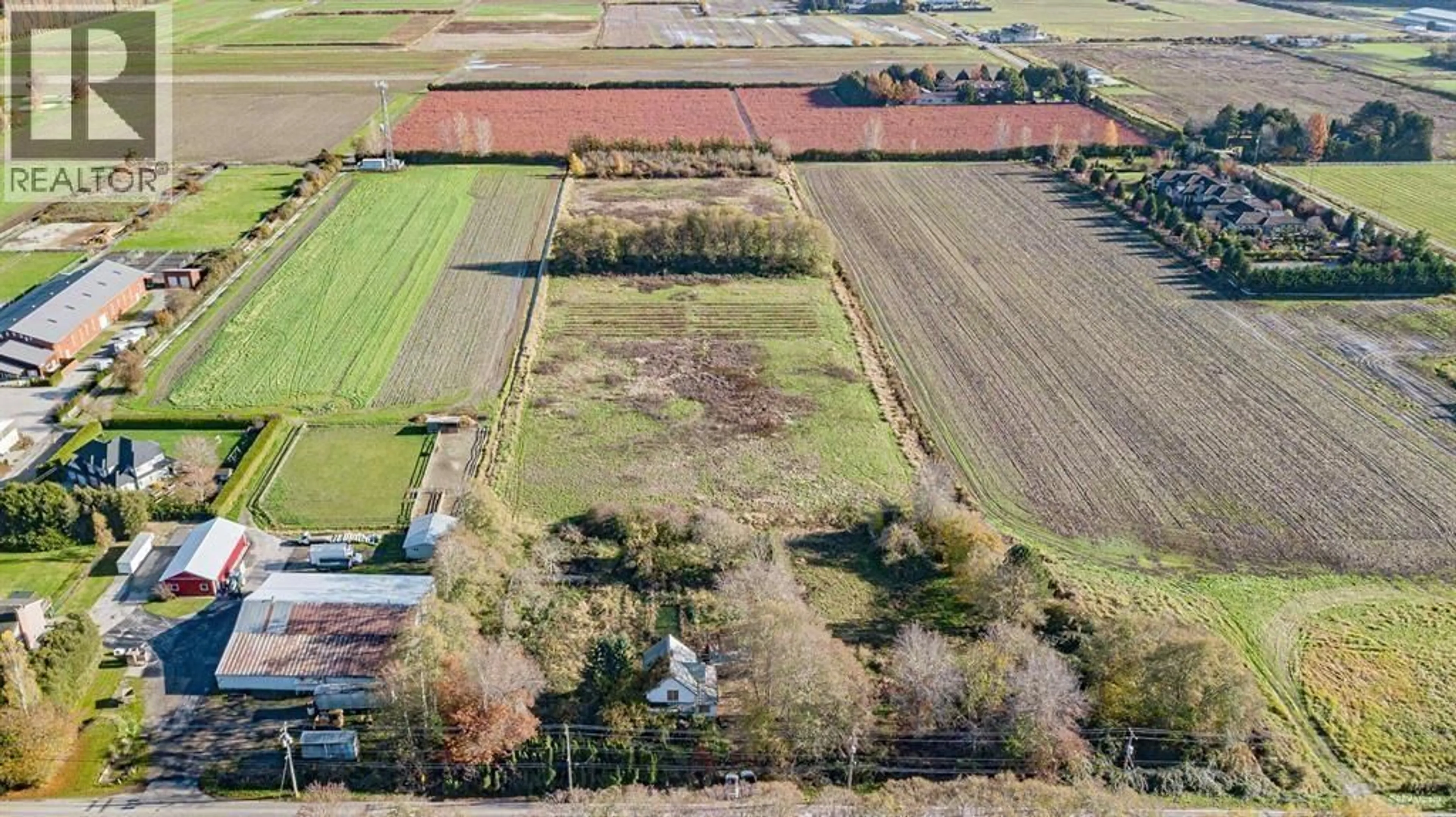 A pic from outside/outdoor area/front of a property/back of a property/a pic from drone, building for 12620 NO. 3 ROAD, Richmond British Columbia V7A1X5