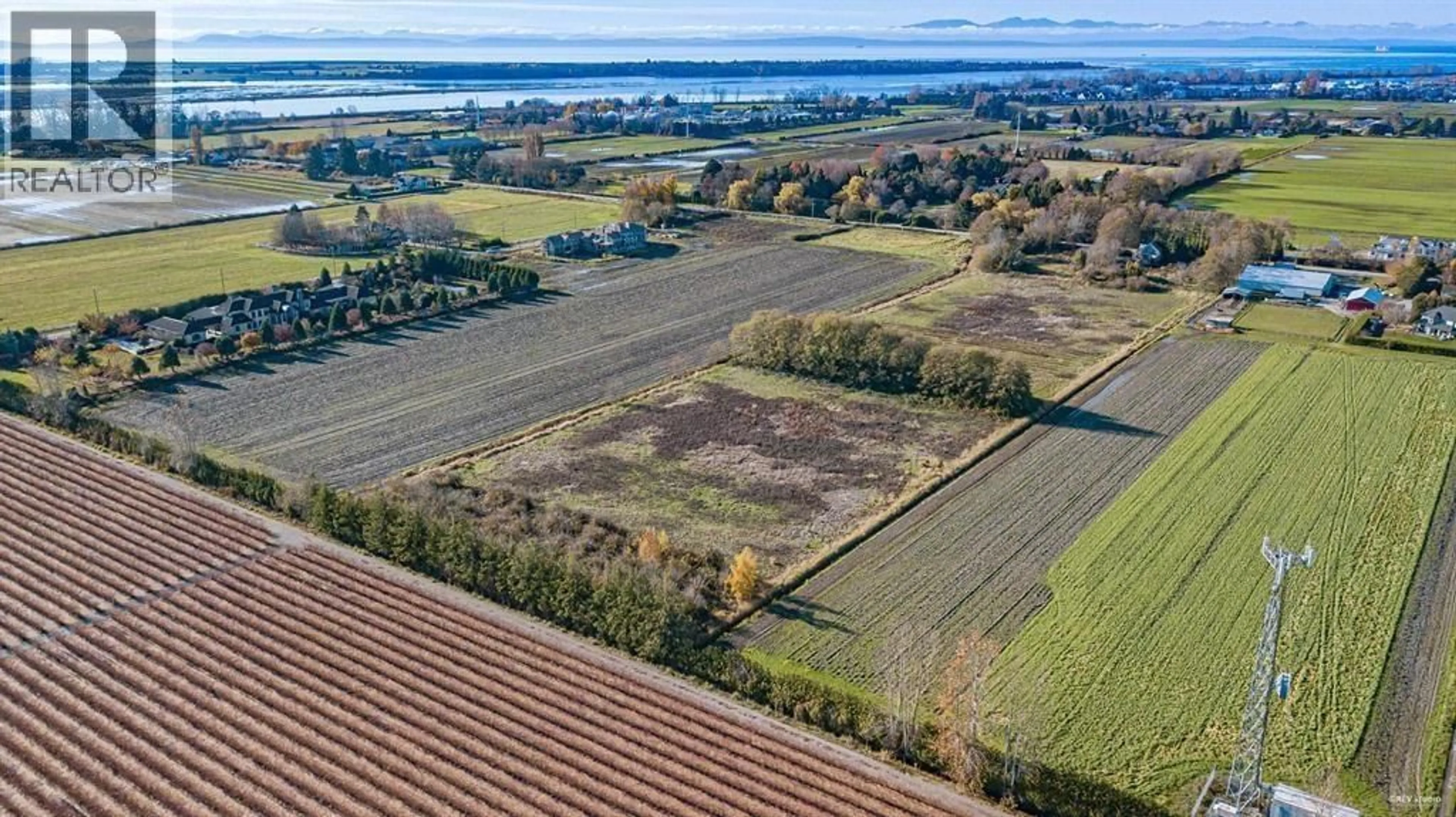 A pic from outside/outdoor area/front of a property/back of a property/a pic from drone, water/lake/river/ocean view for 12620 NO. 3 ROAD, Richmond British Columbia V7A1X5