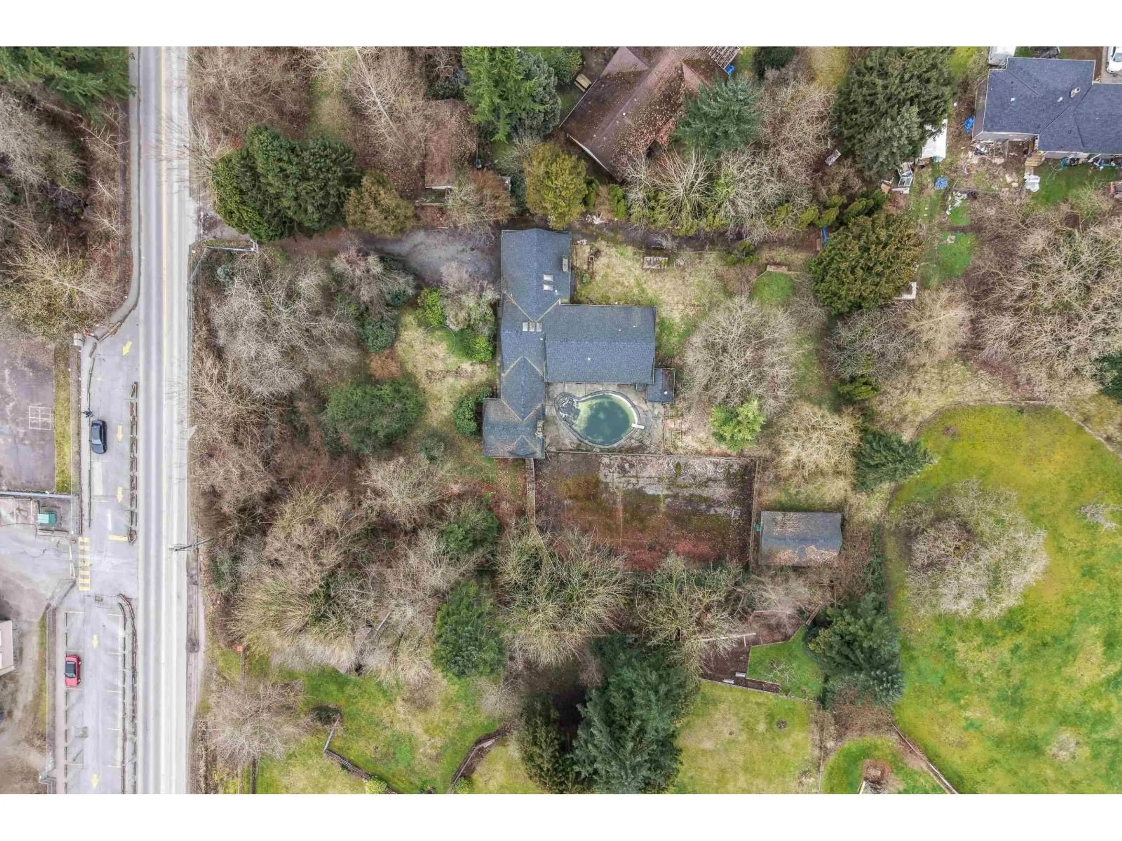 A pic from outside/outdoor area/front of a property/back of a property/a pic from drone, unknown for 7564 184 STREET, Surrey British Columbia V4N5V3