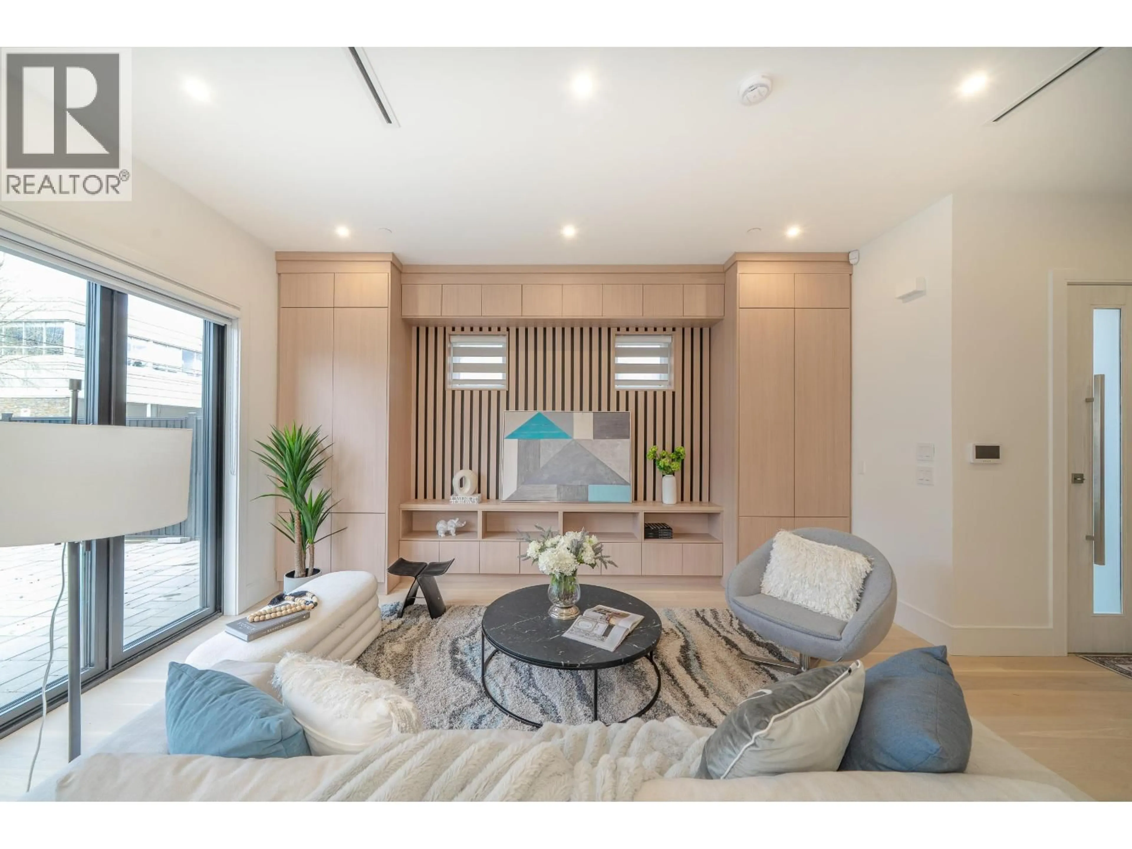 Living room with furniture, wood/laminate floor for 748 47TH AVENUE, Vancouver British Columbia V5W3C4