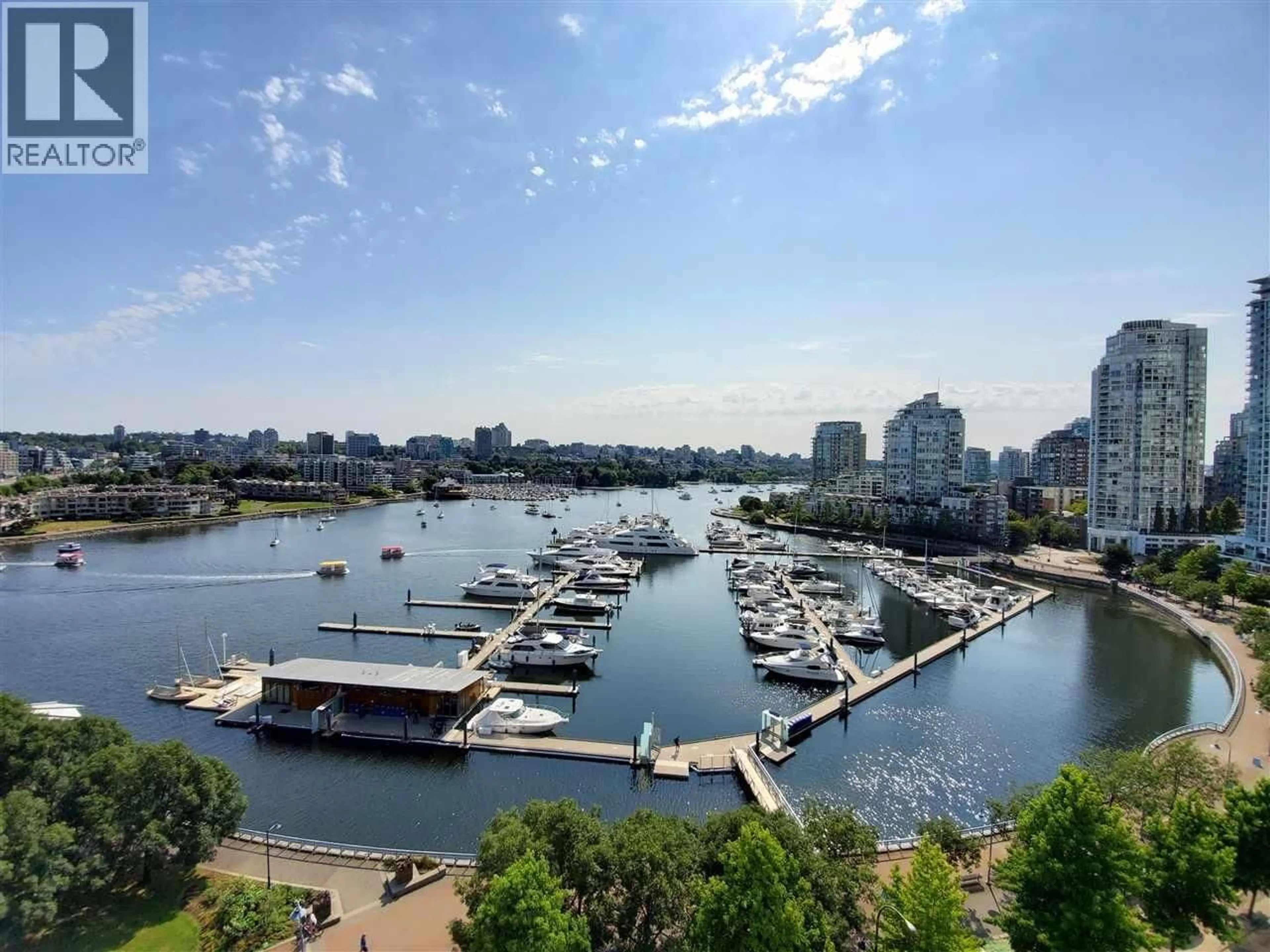 A pic from outside/outdoor area/front of a property/back of a property/a pic from drone, water/lake/river/ocean view for 1507 - 1033 MARINASIDE CRESCENT, Vancouver British Columbia V6Z3A3