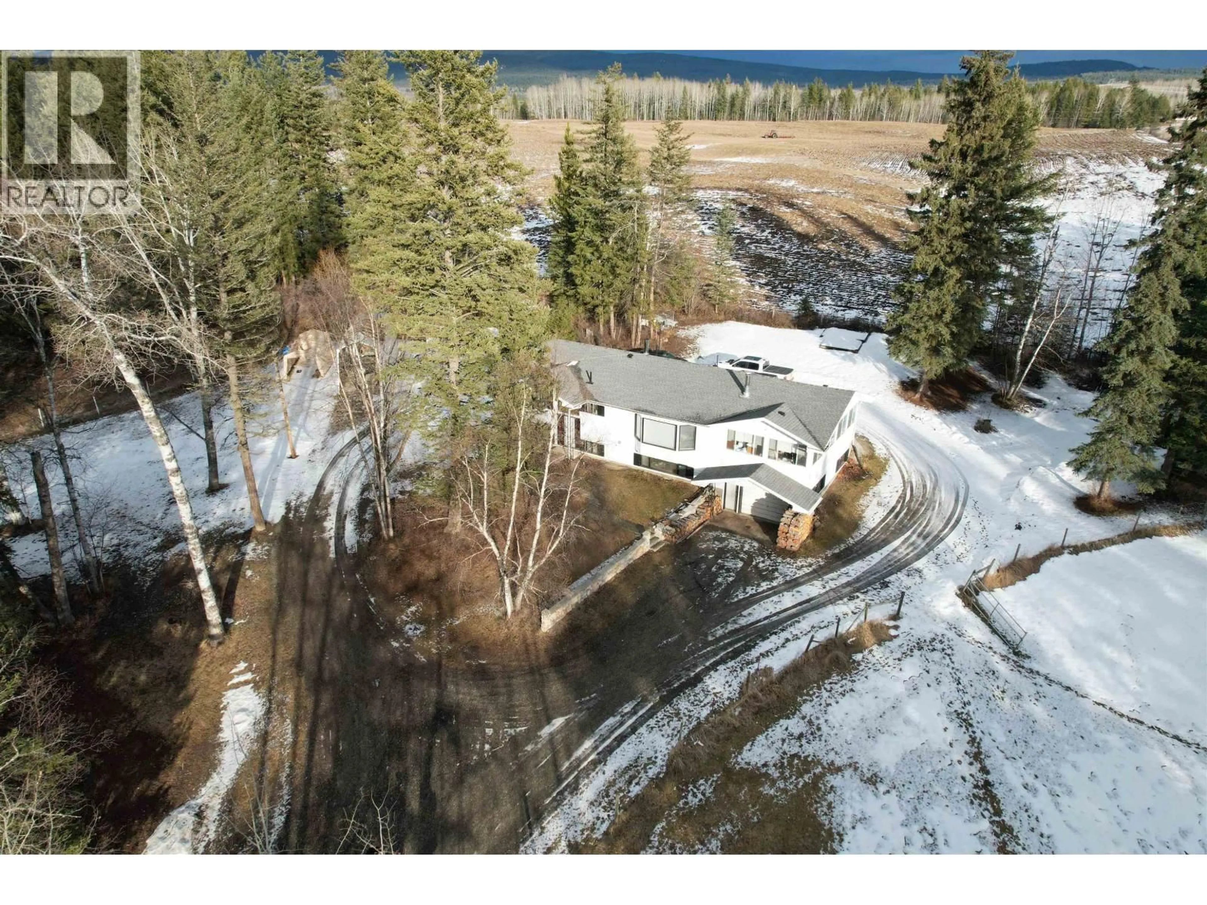 A pic from outside/outdoor area/front of a property/back of a property/a pic from drone, water/lake/river/ocean view for 4793 97 HIGHWAY, Quesnel British Columbia V2J6M8