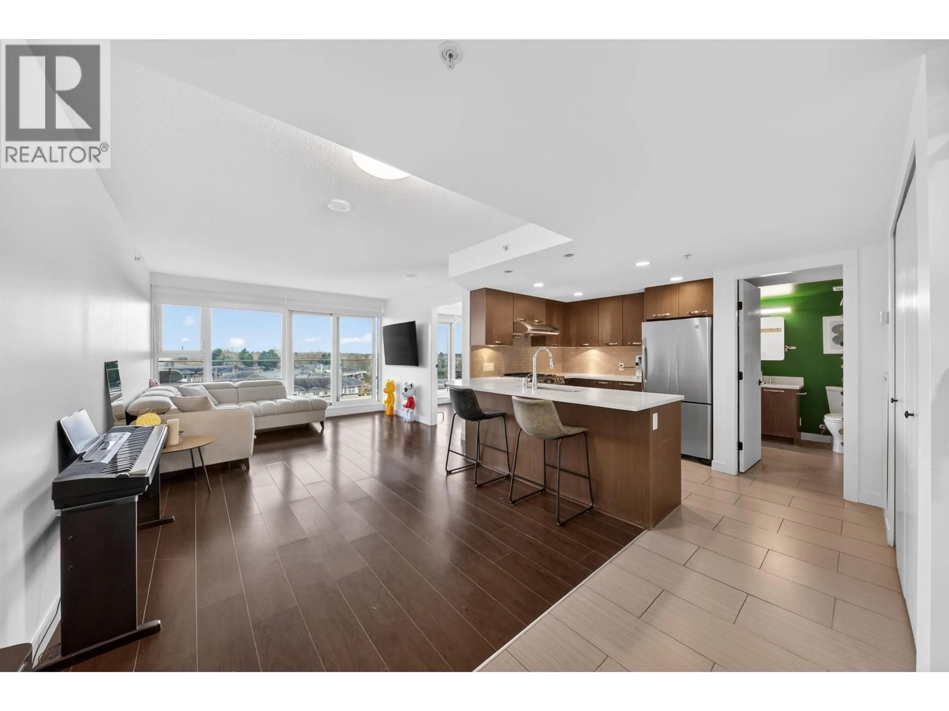 Open concept kitchen, wood/laminate floor for 1010 - 6888 COONEY ROAD, Richmond British Columbia V6Y0E1