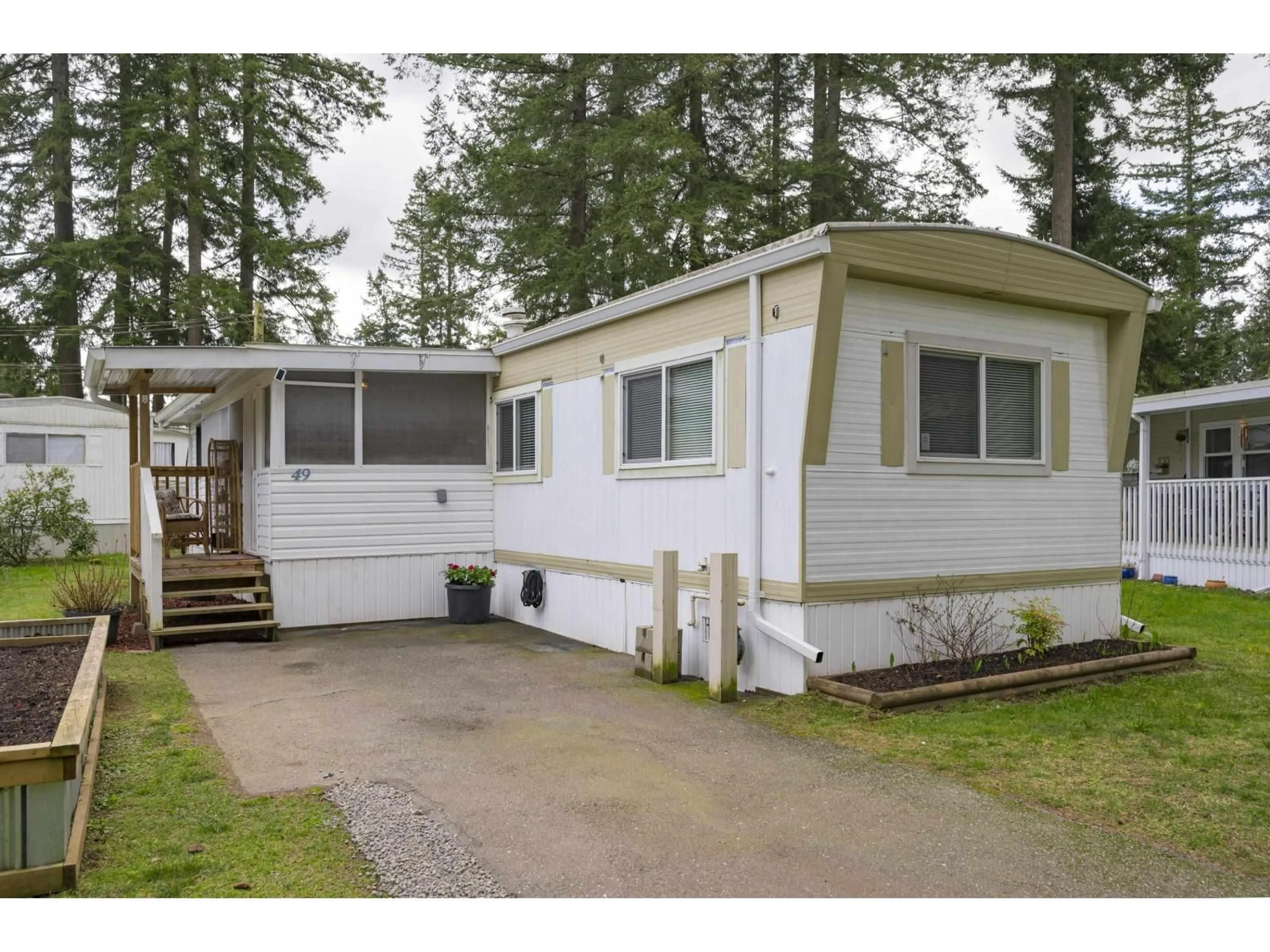 Home with vinyl exterior material, street for 49 - 20071 24 AVENUE, Langley British Columbia V2Z2A1