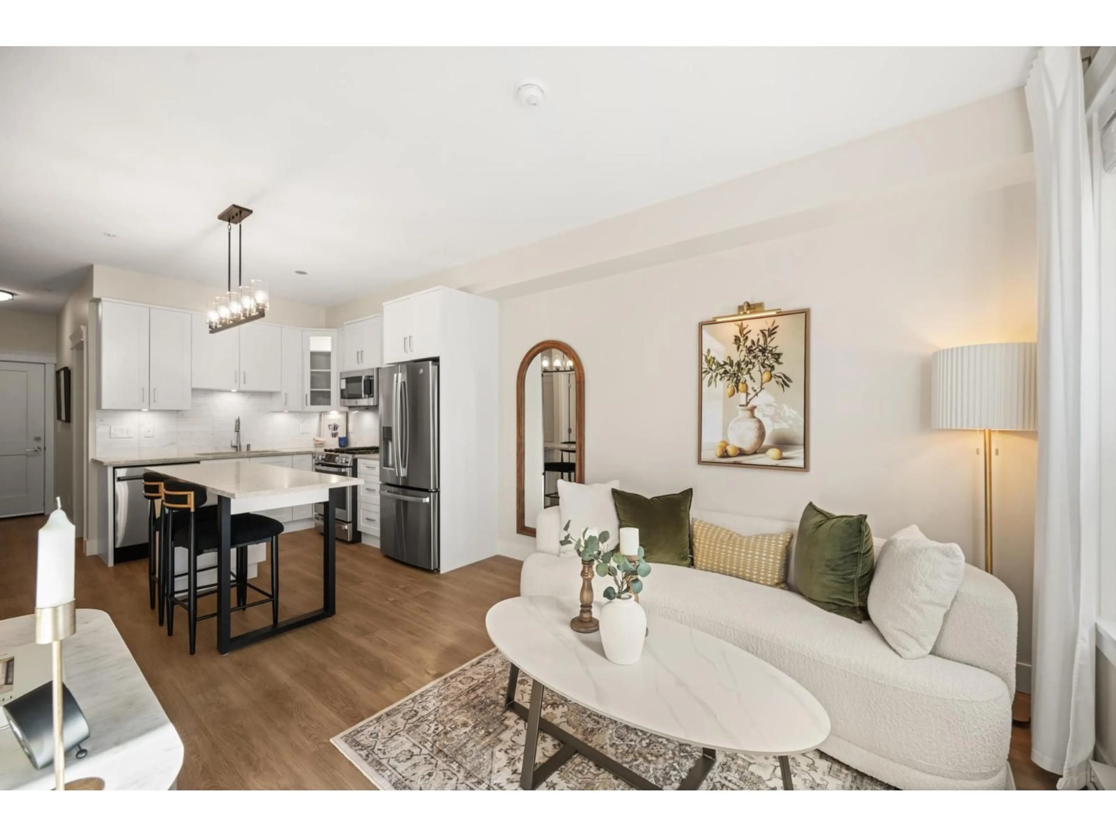 Open concept kitchen, wood/laminate floor for 414 - 20926 83 AVENUE, Langley British Columbia V2Y3Y9