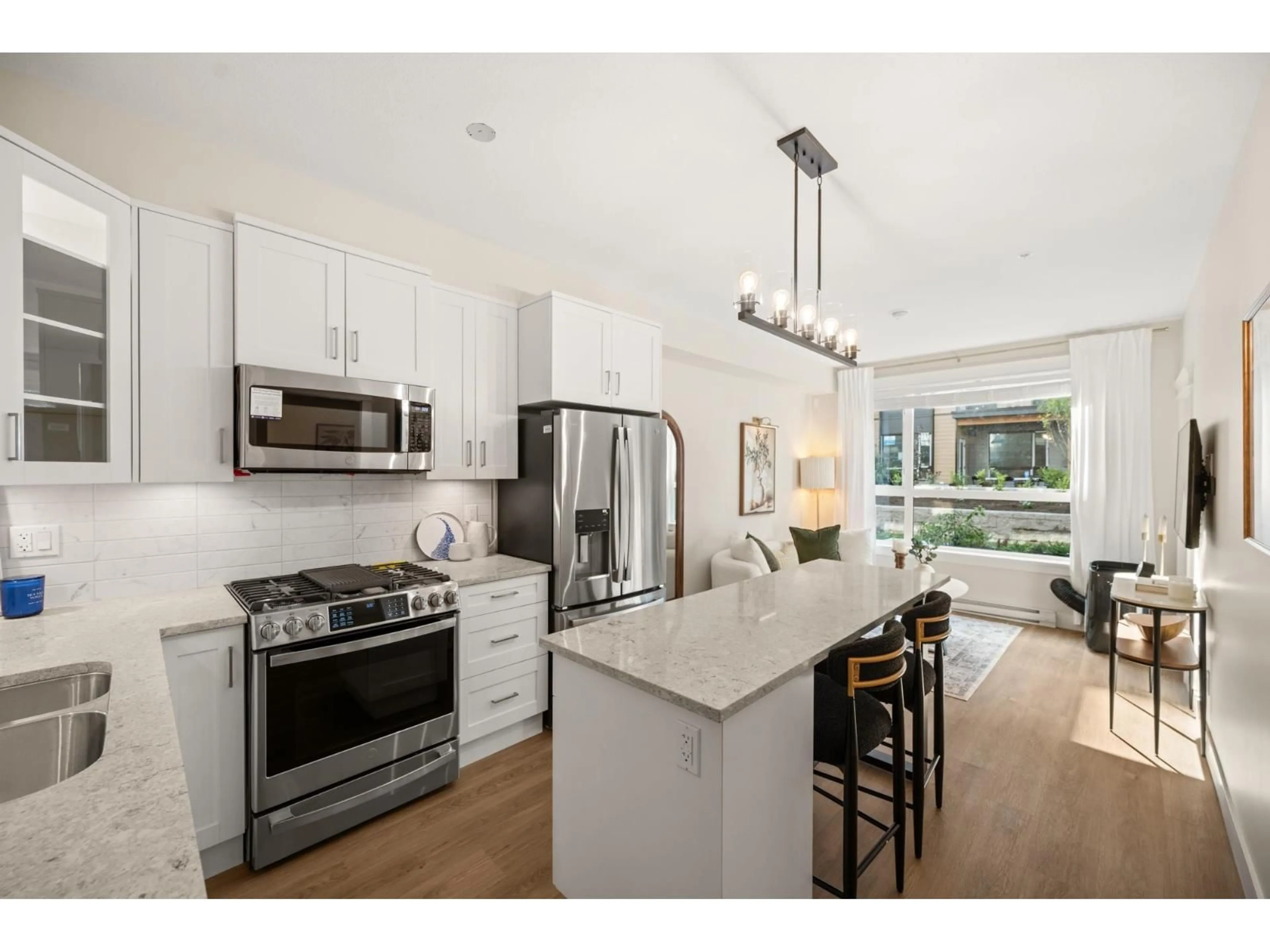 Open concept kitchen, unknown for 414 - 20926 83 AVENUE, Langley British Columbia V2Y3Y9