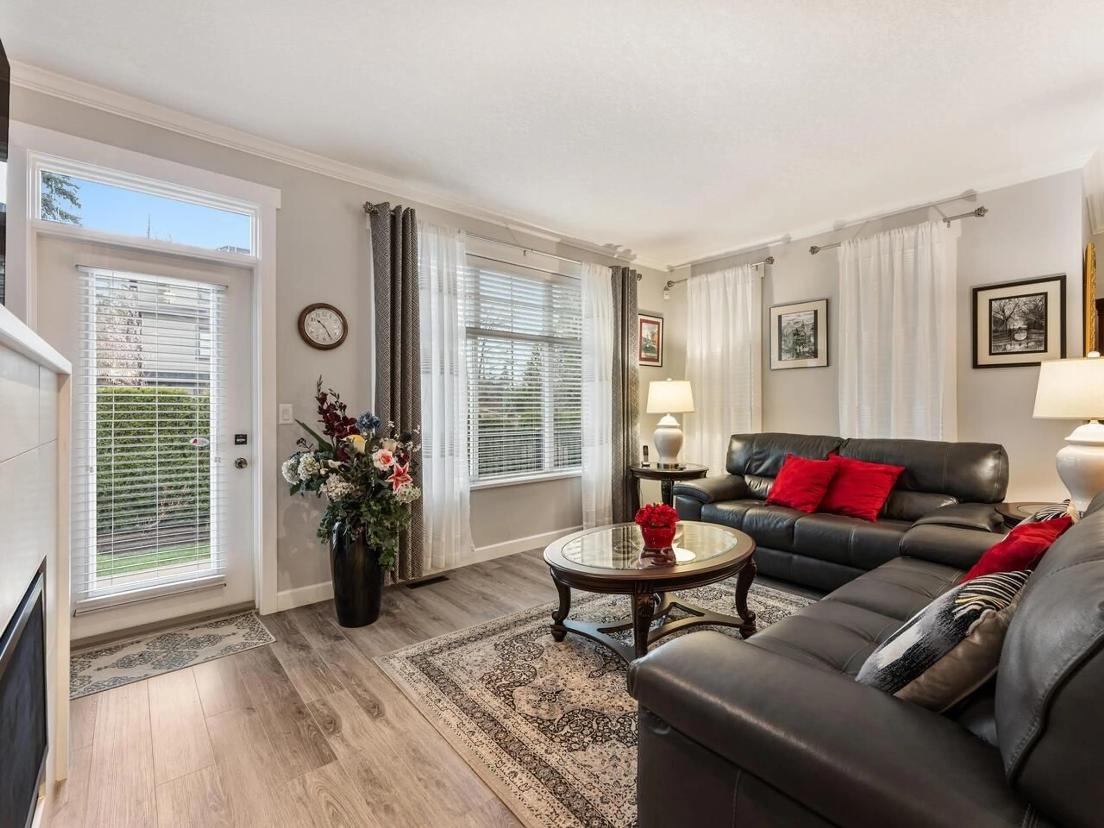 Living room with furniture, wood/laminate floor for 69 - 7138 210 STREET, Langley British Columbia V2Y0V7