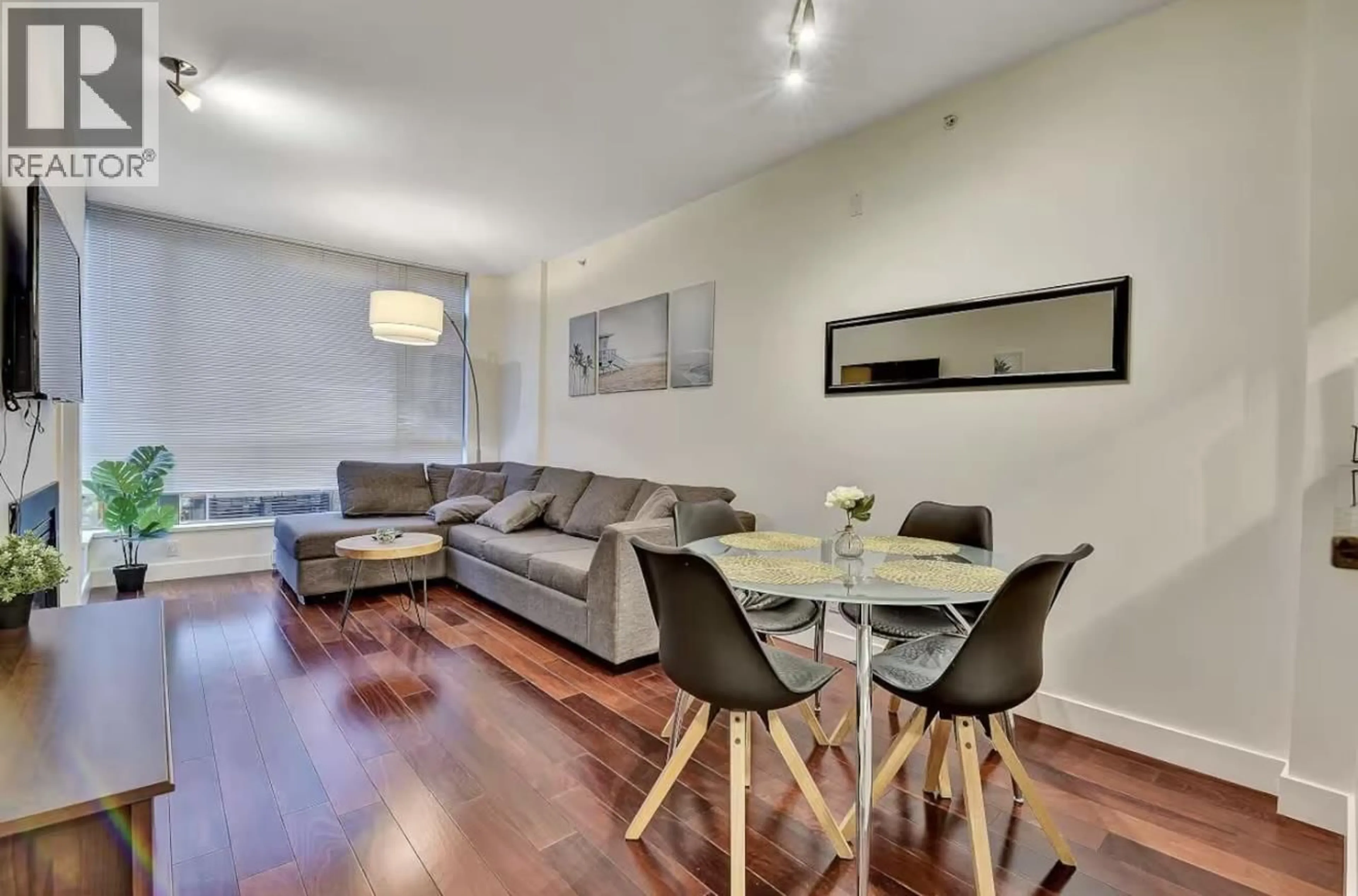 Living room with furniture, wood/laminate floor for 401 - 1238 BURRARD STREET, Vancouver British Columbia V6Z3E1