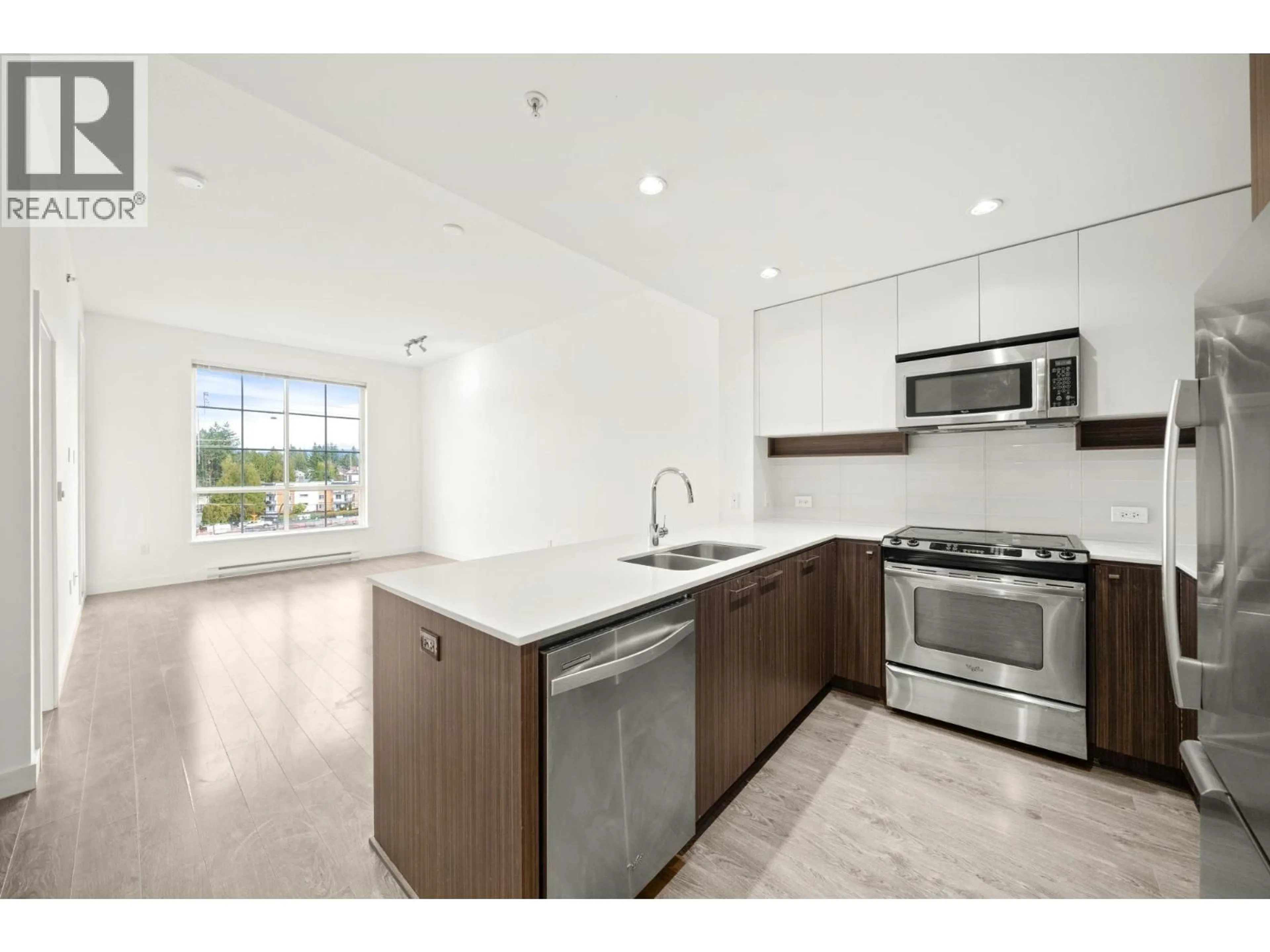 Open concept kitchen, unknown for 417 - 608 COMO LAKE AVENUE, Coquitlam British Columbia V3J0B2
