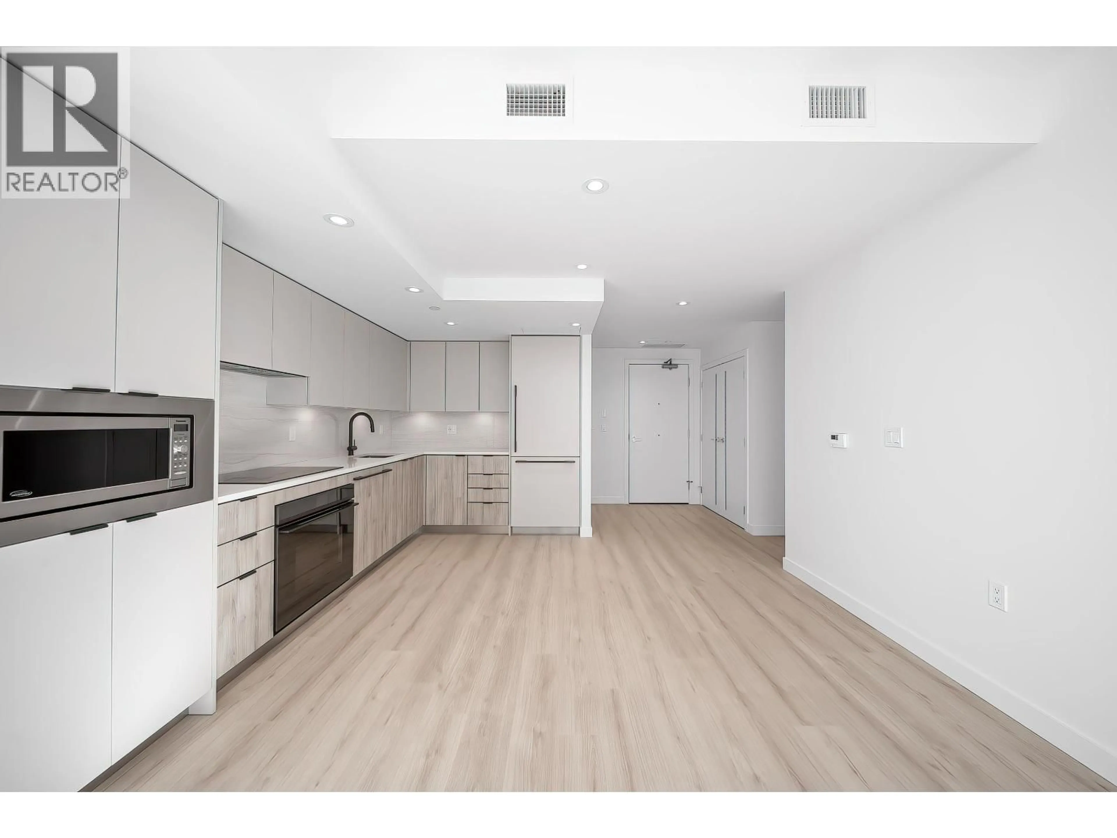 Open concept kitchen, unknown for 619 - 755 HARBOURSIDE DRIVE, Vancouver British Columbia V7P0G1