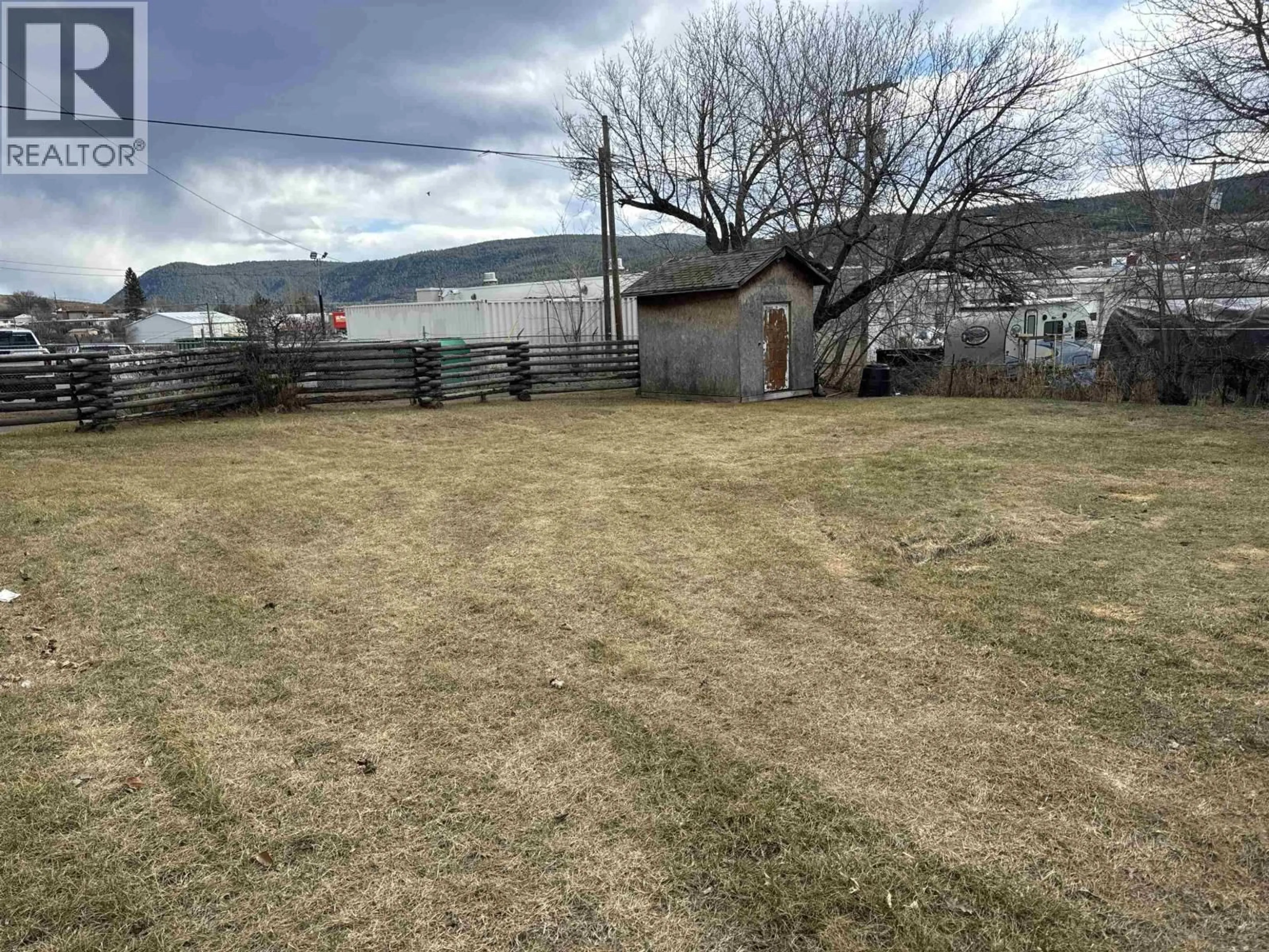 A pic from outside/outdoor area/front of a property/back of a property/a pic from drone, mountain view for 242 THIRD AVENUE, Williams Lake British Columbia V2G1J4