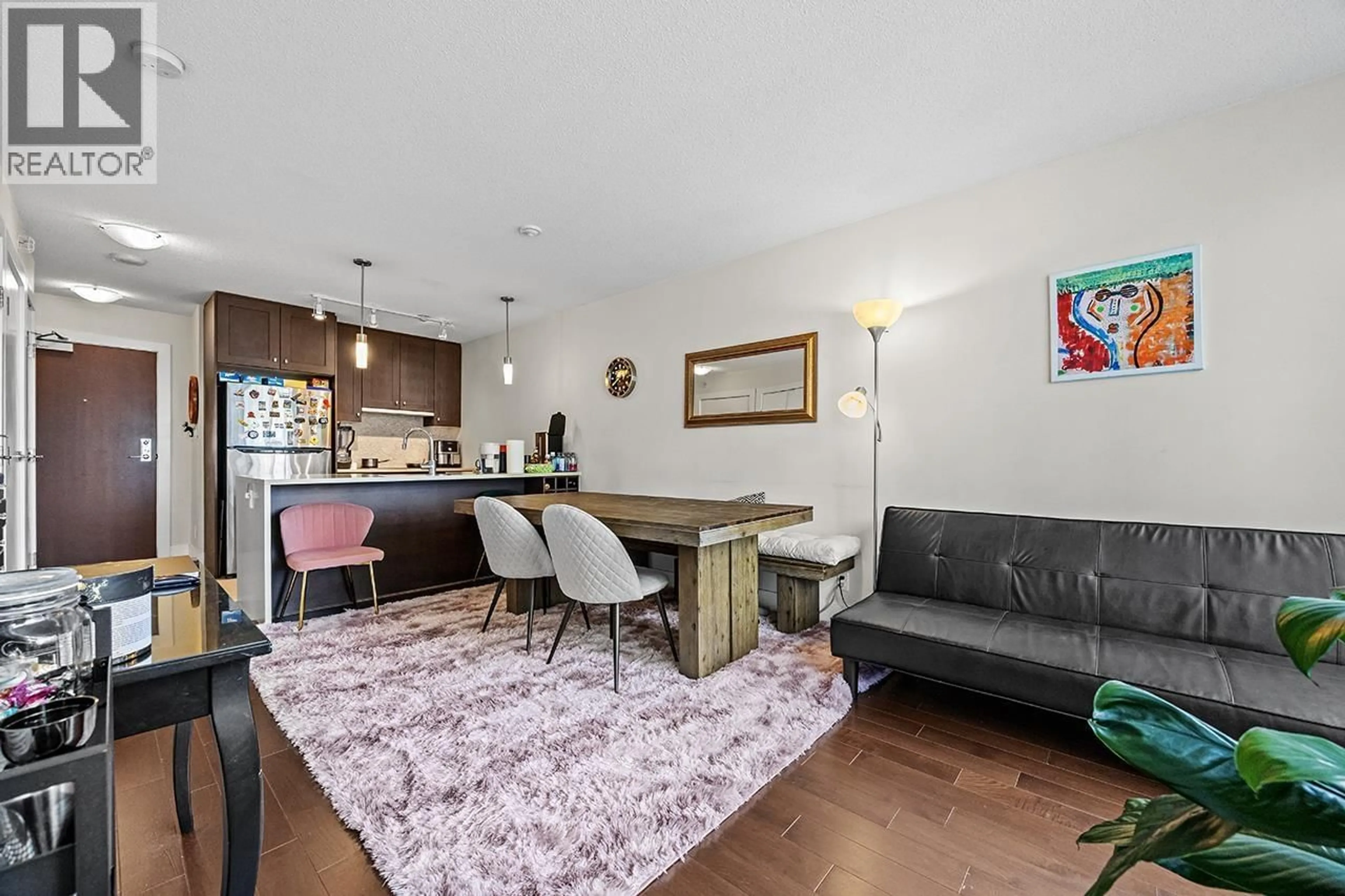 Living room with furniture, wood/laminate floor for 1502 - 888 HOMER STREET, Vancouver British Columbia V6B0H7