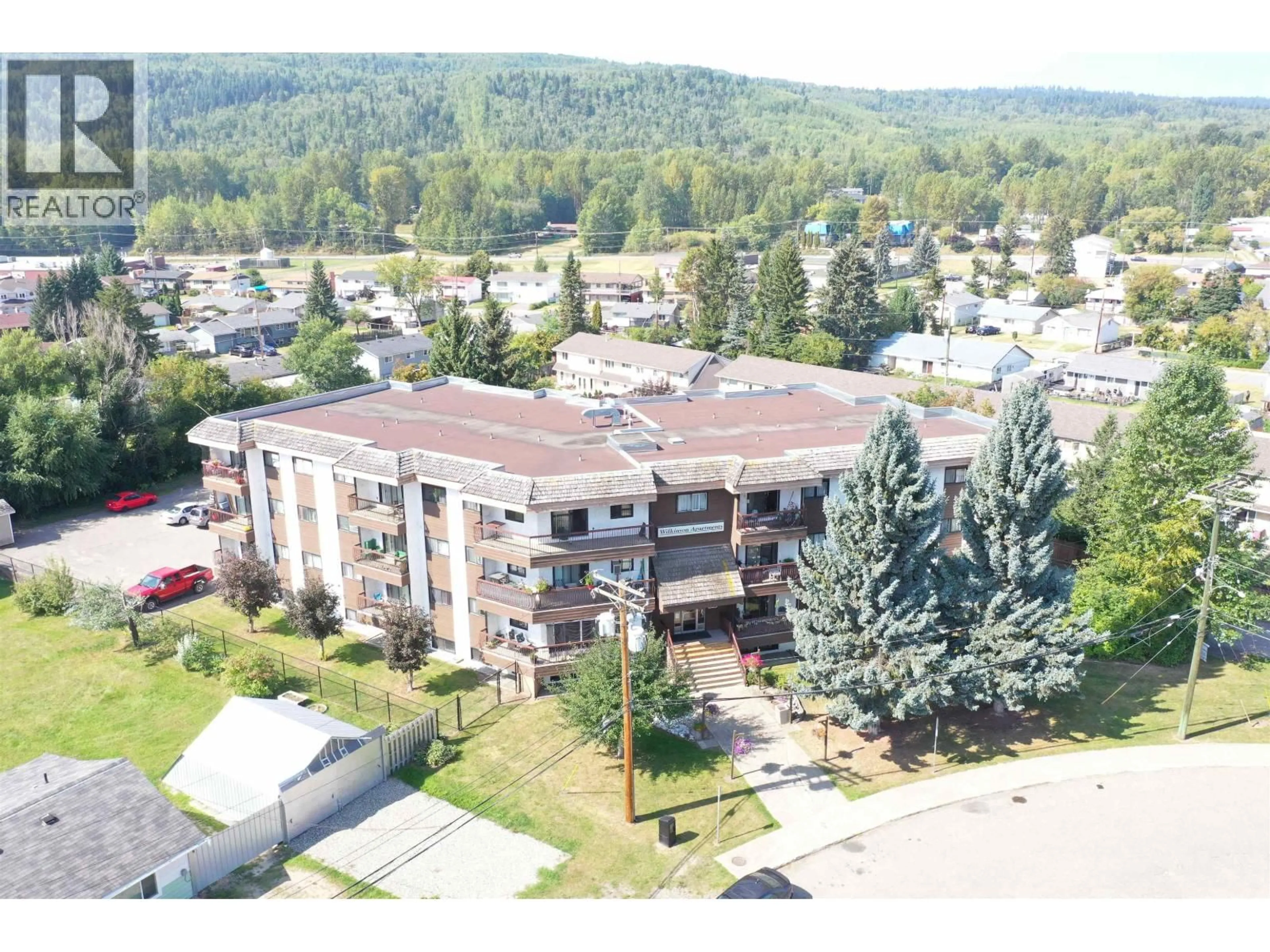 A pic from outside/outdoor area/front of a property/back of a property/a pic from drone, mountain view for 305 - 398 RODDIS DRIVE, Quesnel British Columbia V2J1A6