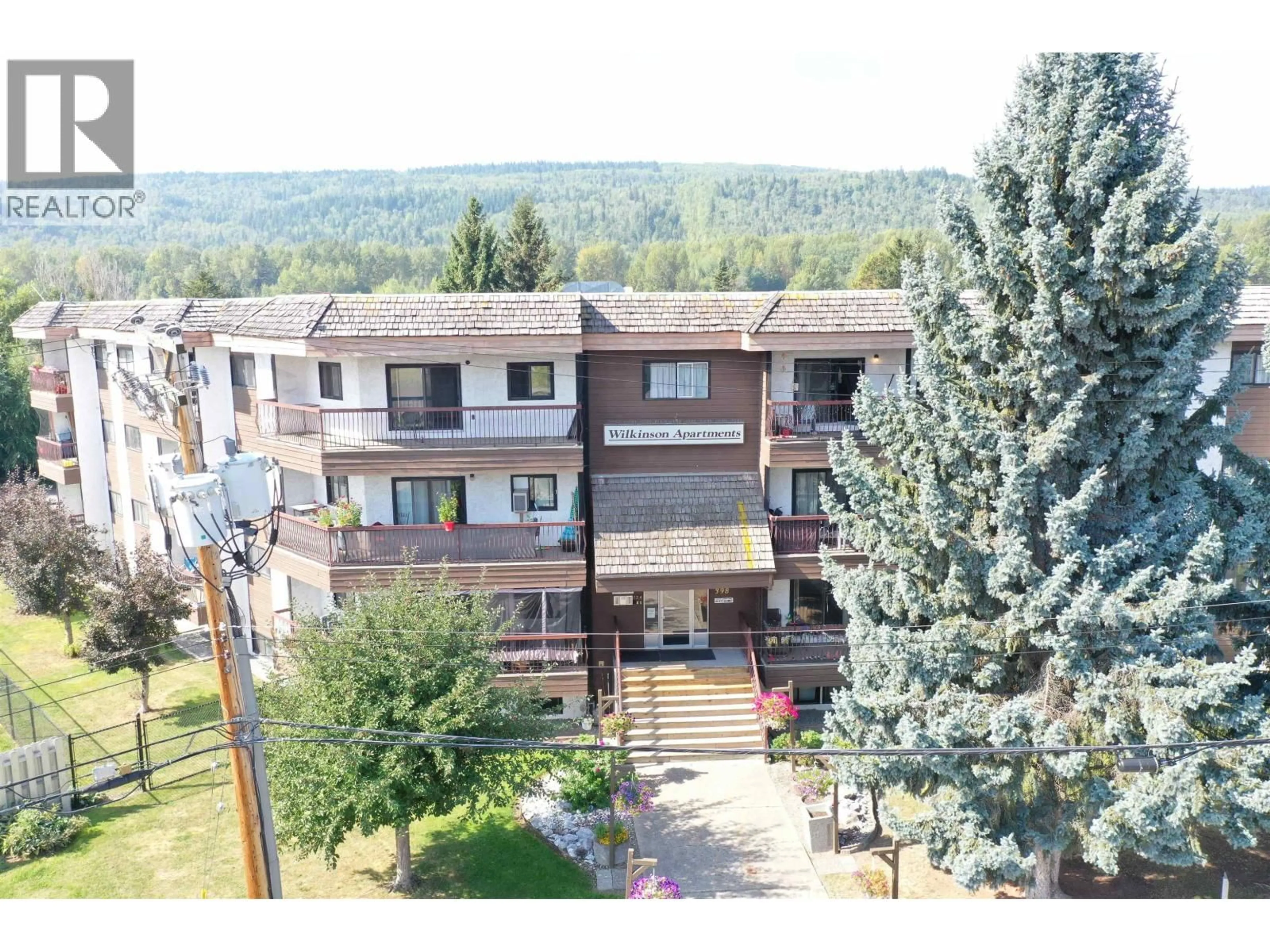 A pic from outside/outdoor area/front of a property/back of a property/a pic from drone, mountain view for 305 - 398 RODDIS DRIVE, Quesnel British Columbia V2J1A6