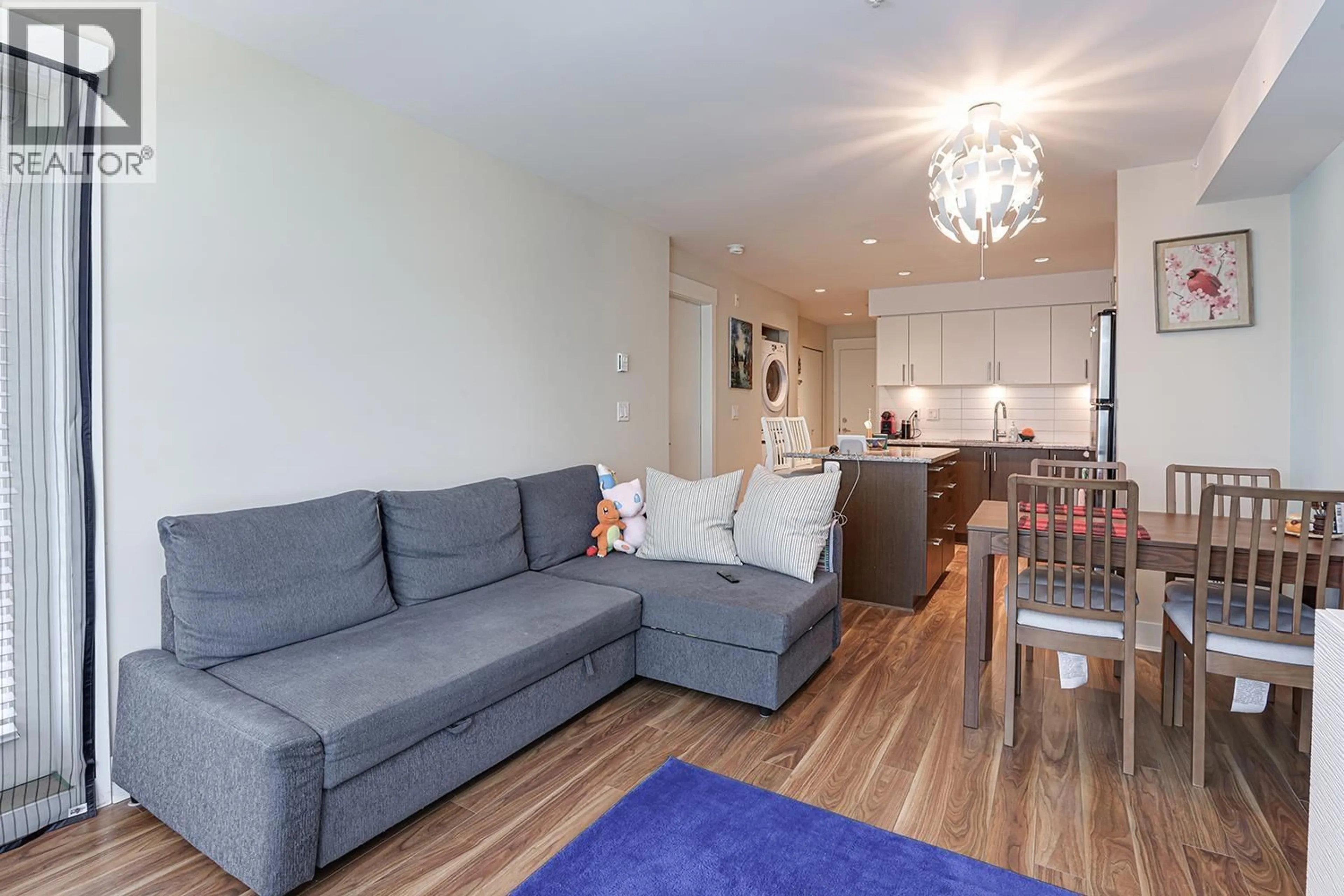 Living room with furniture, wood/laminate floor for 208 - 55 EIGHTH AVENUE, New Westminster British Columbia V3L0E8