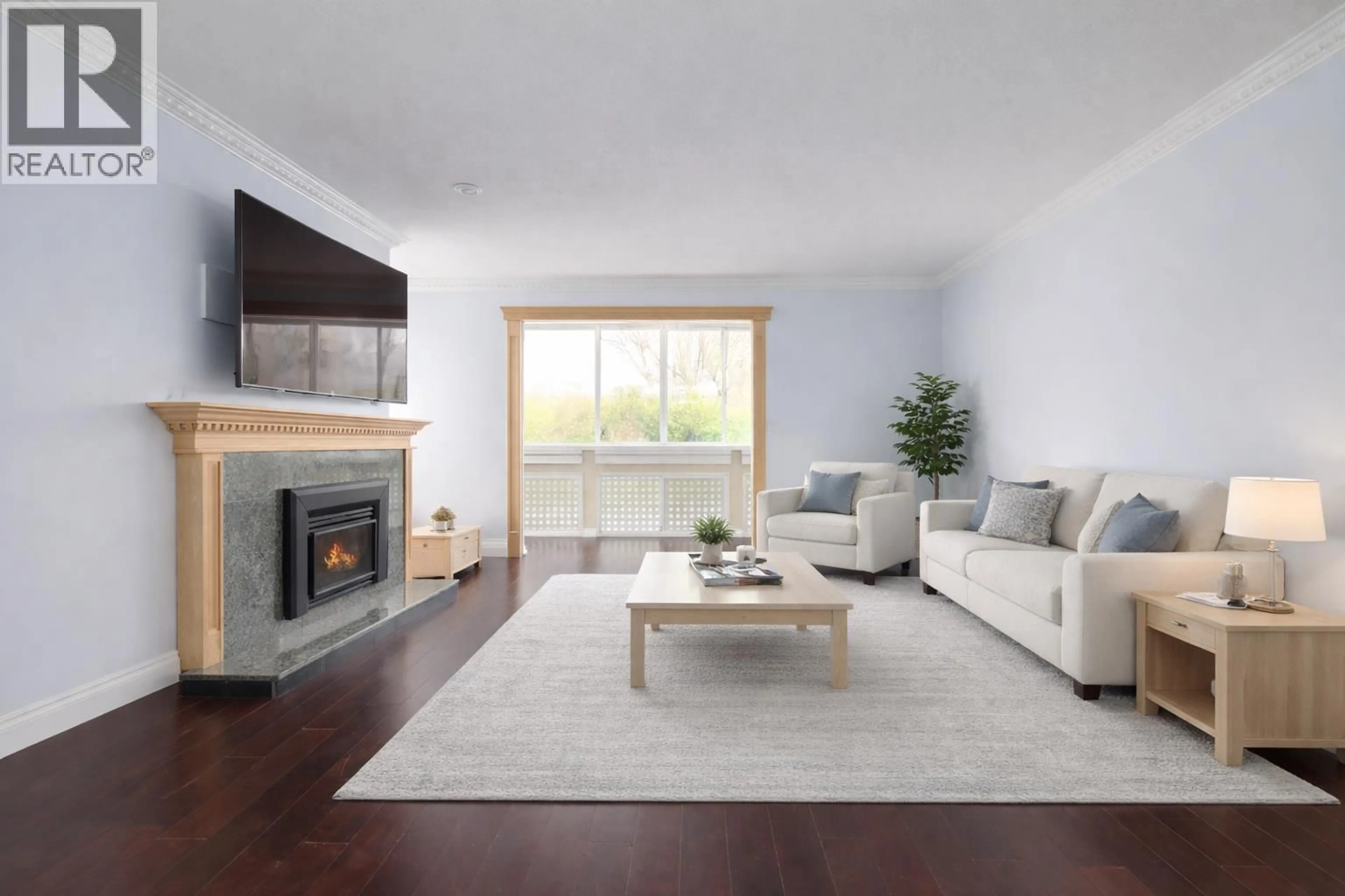 Living room with furniture, wood/laminate floor for 255 - 1440 GARDEN PLACE, Delta British Columbia V4M3Z2