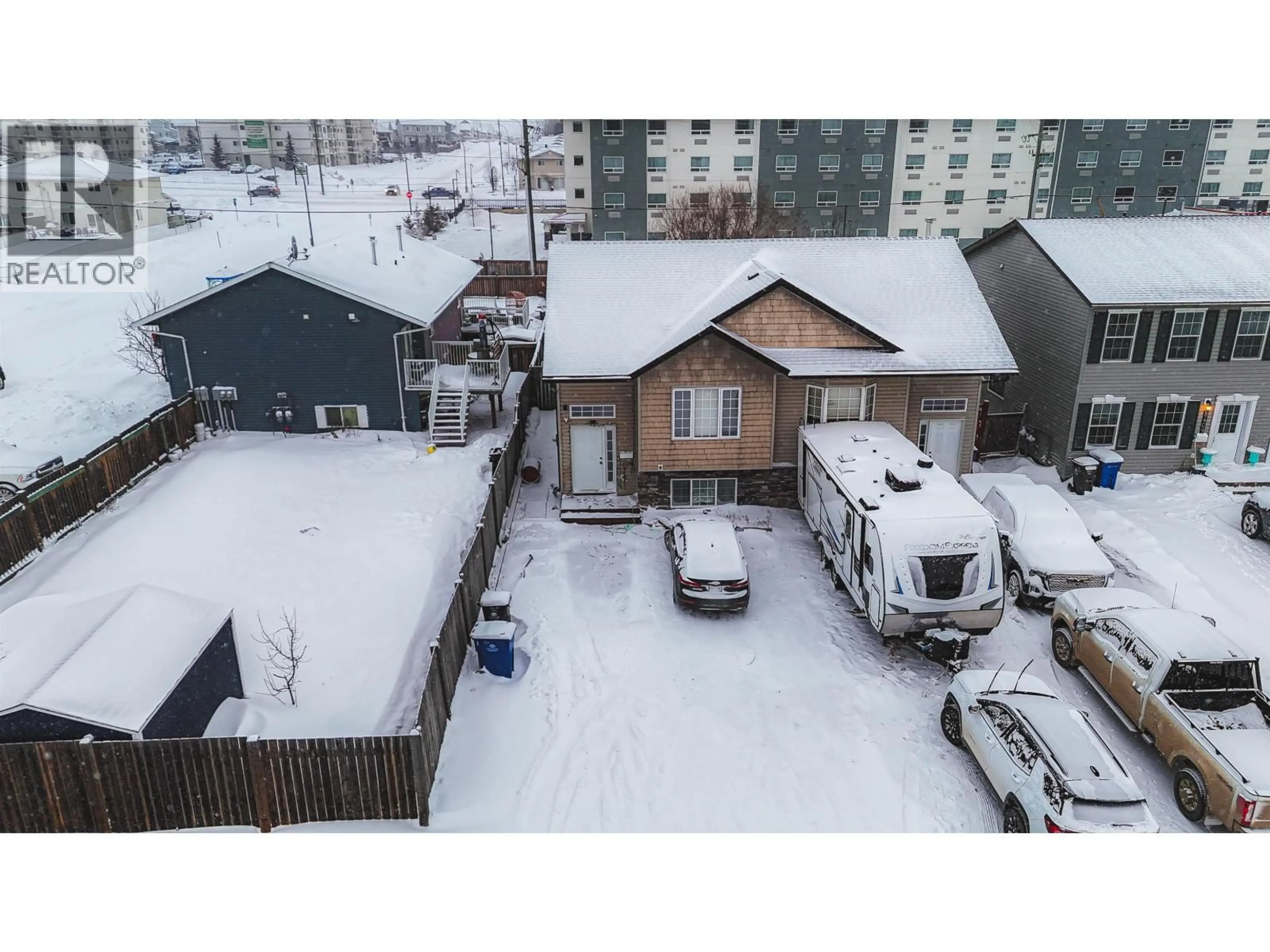 A pic from outside/outdoor area/front of a property/back of a property/a pic from drone, street for 8413 87 STREET, Fort St. John British Columbia V1J0H4
