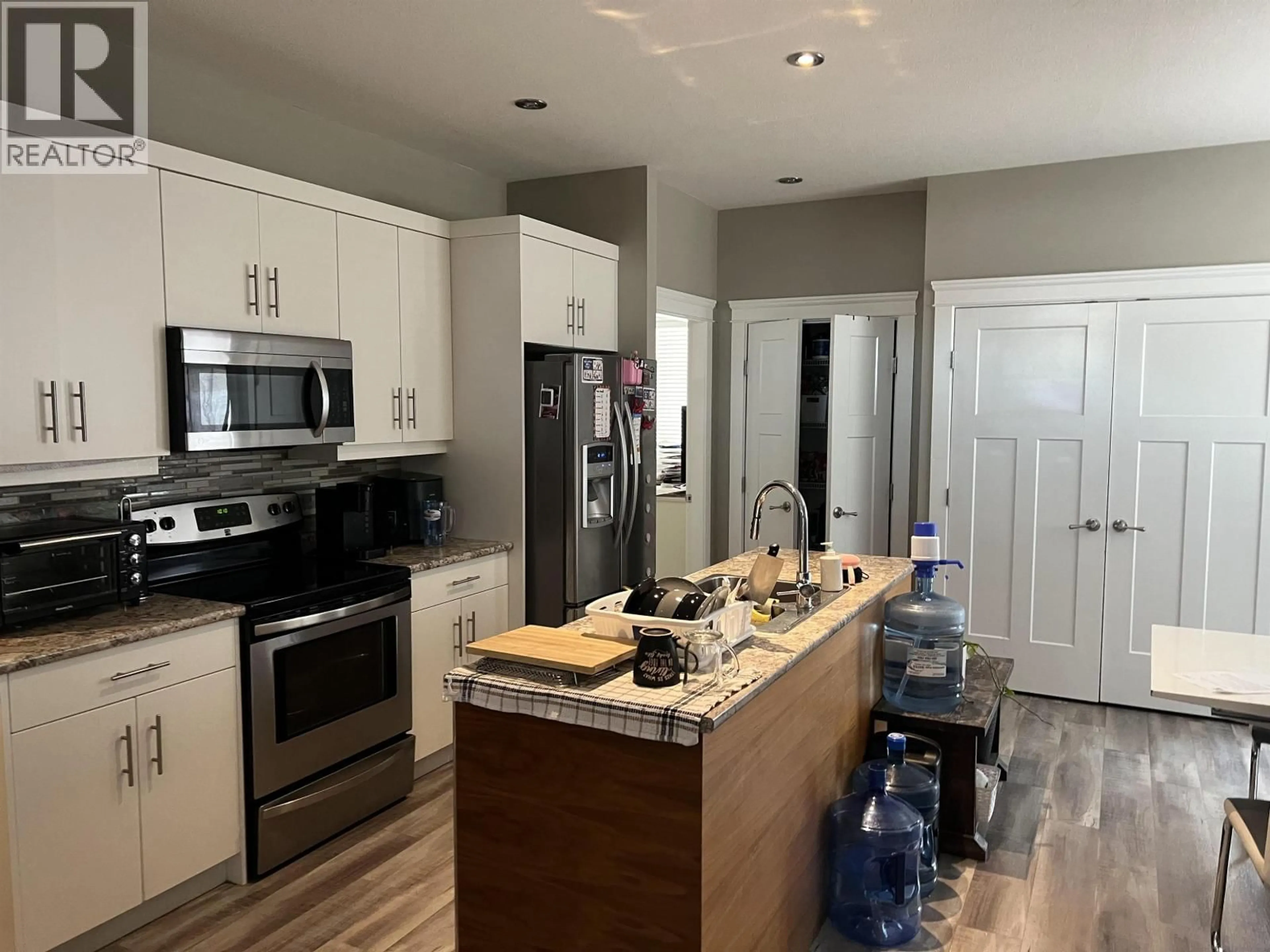 Open concept kitchen, unknown for 8215 88 AVENUE, Fort St. John British Columbia V1J0N9