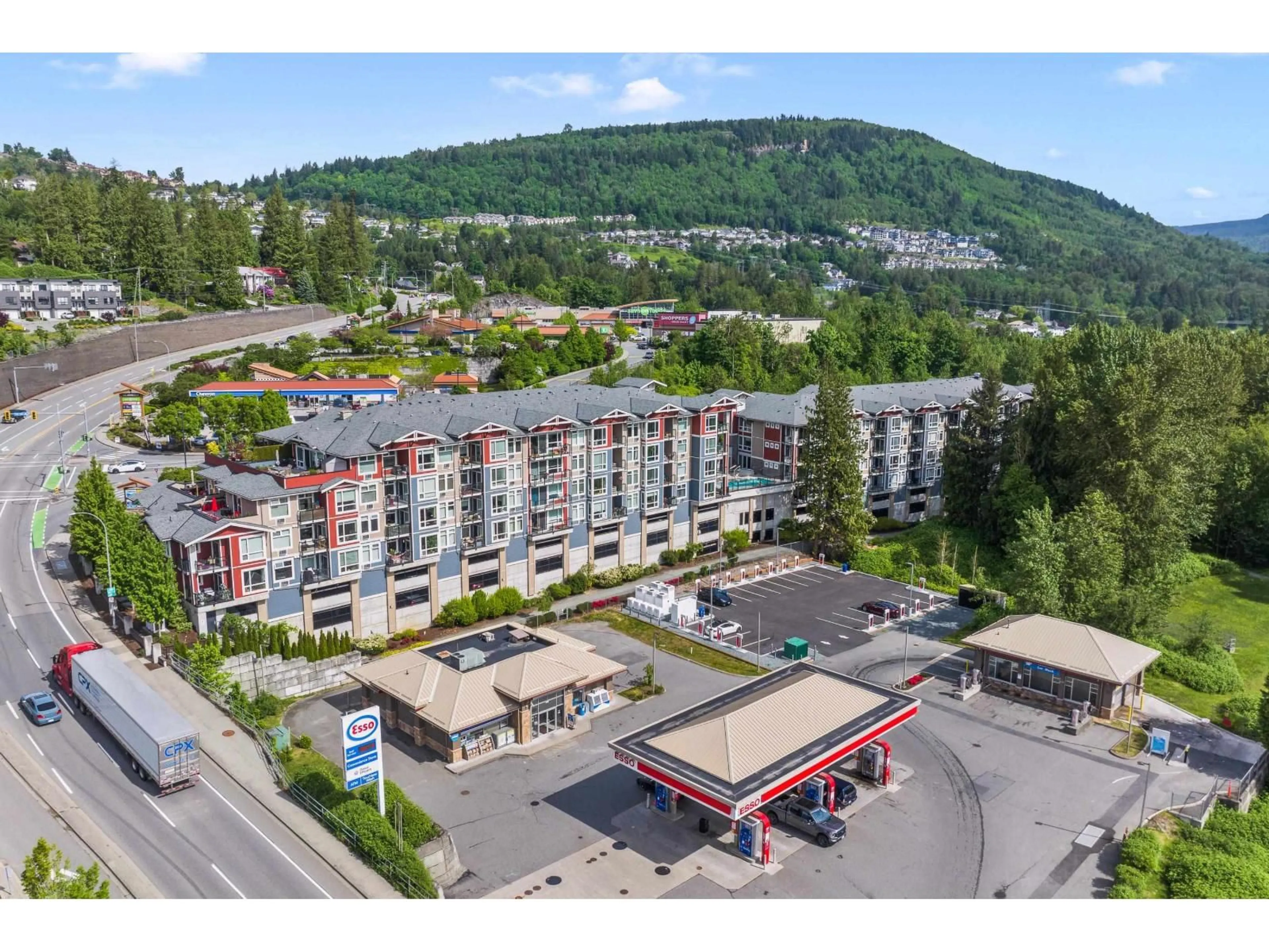 A pic from outside/outdoor area/front of a property/back of a property/a pic from drone, mountain view for 404 - 2238 WHATCOM ROAD, Abbotsford British Columbia V3G0E6